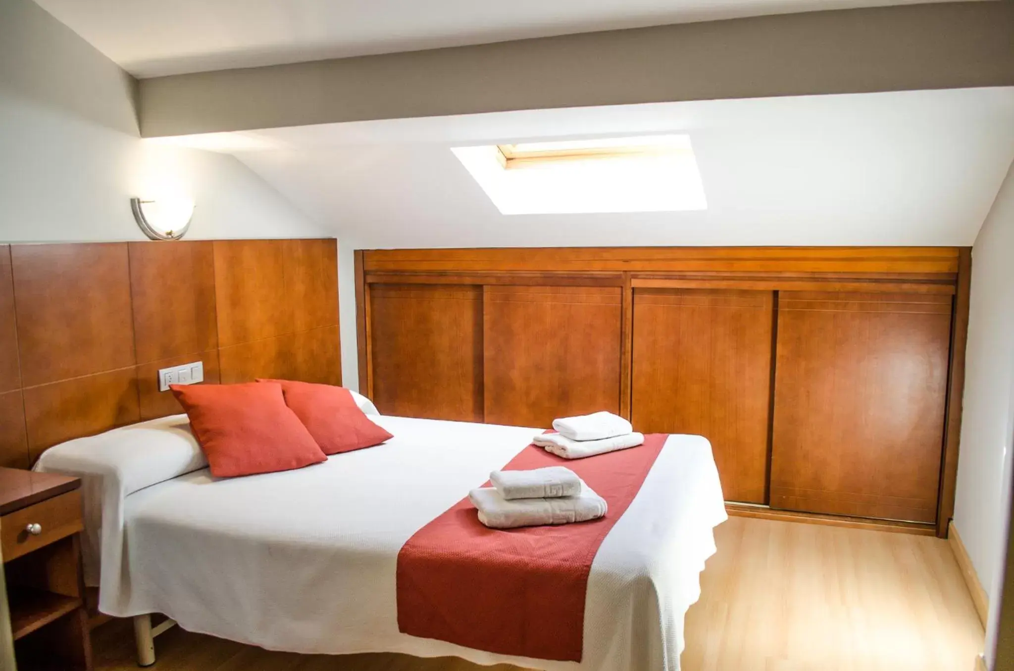 Bed in Hotel Jaqués