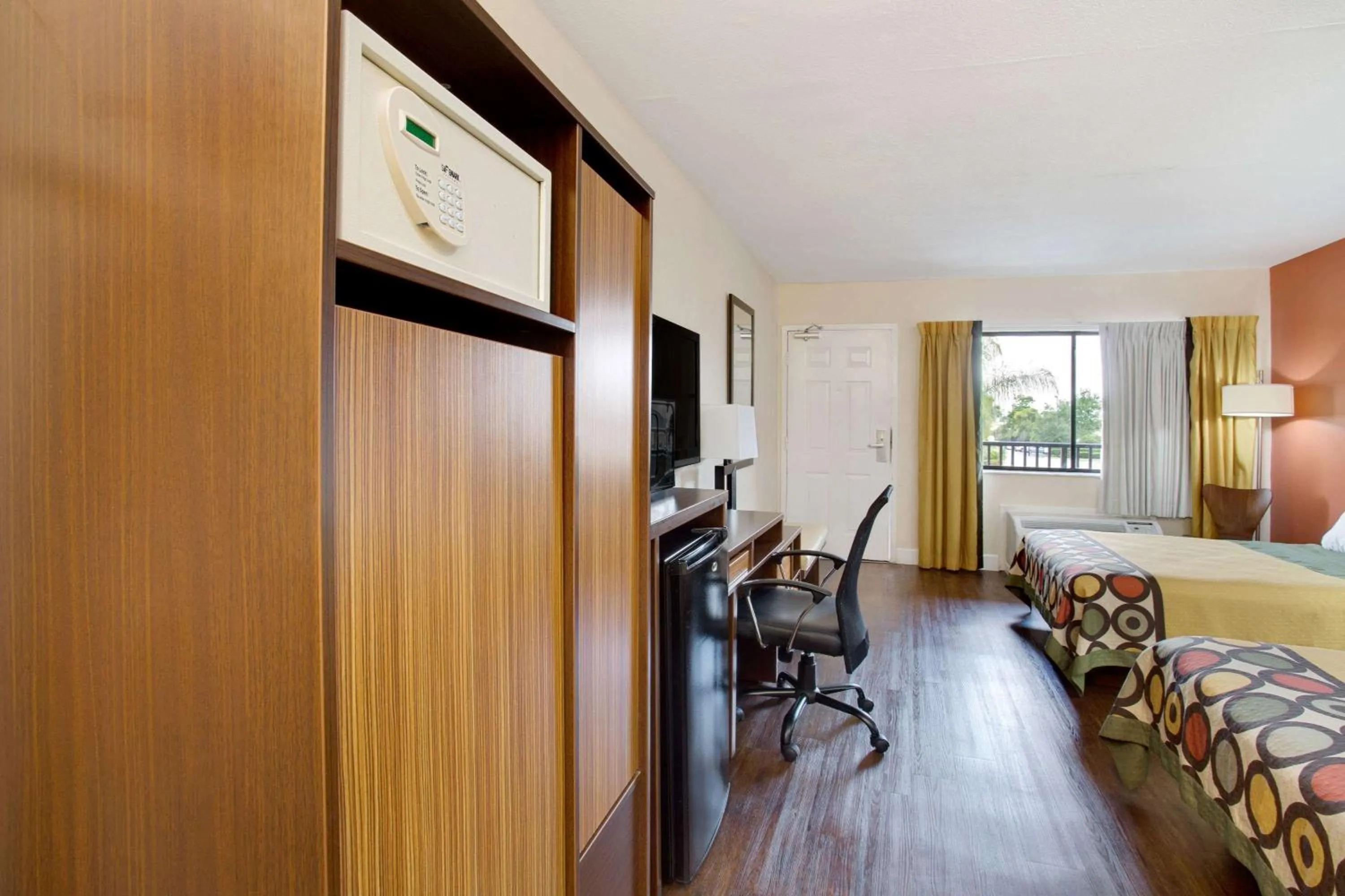 Photo of the whole room, Bed in Super 8 by Wyndham Orlando International Drive