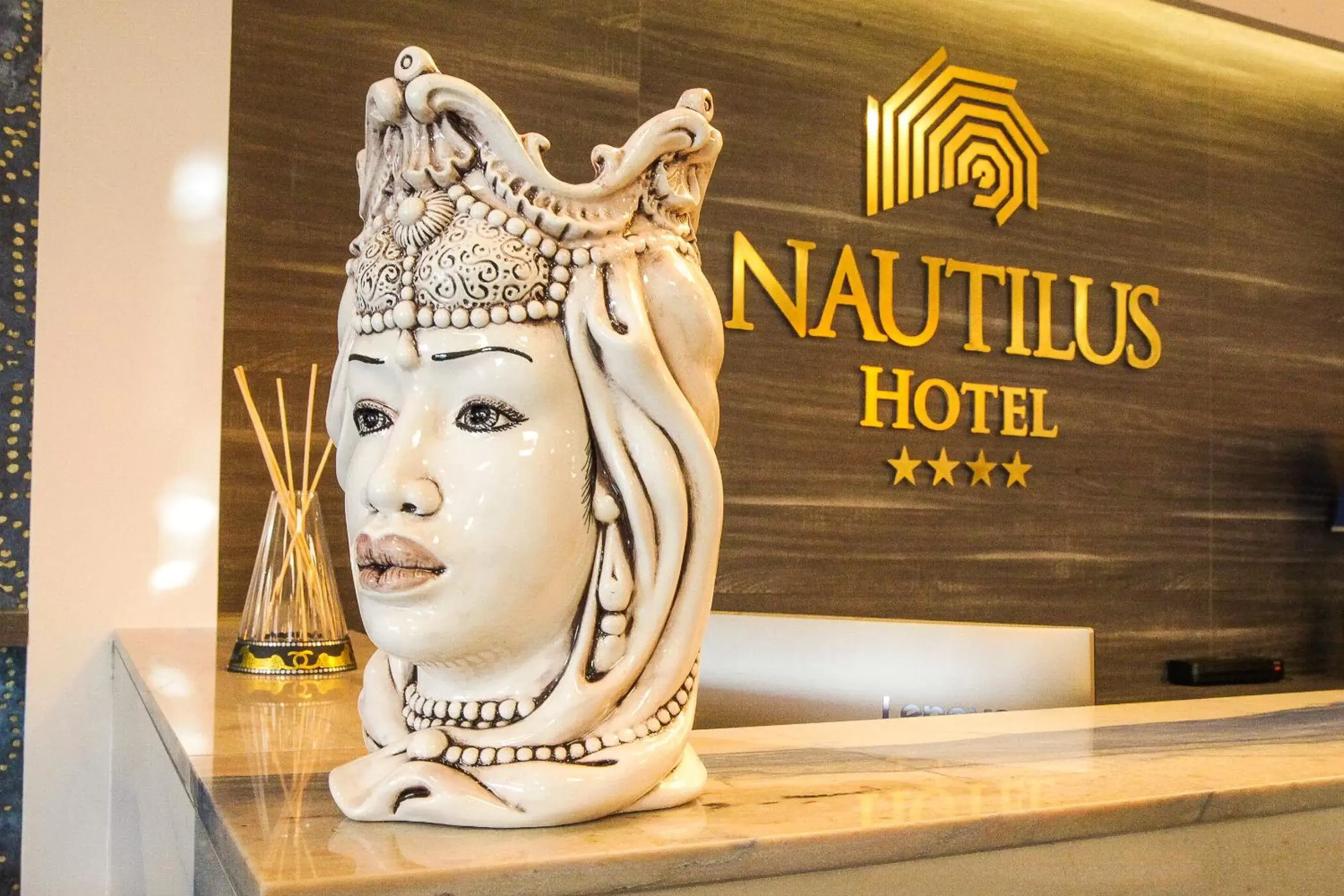 Property logo or sign in Nautilus Hotel