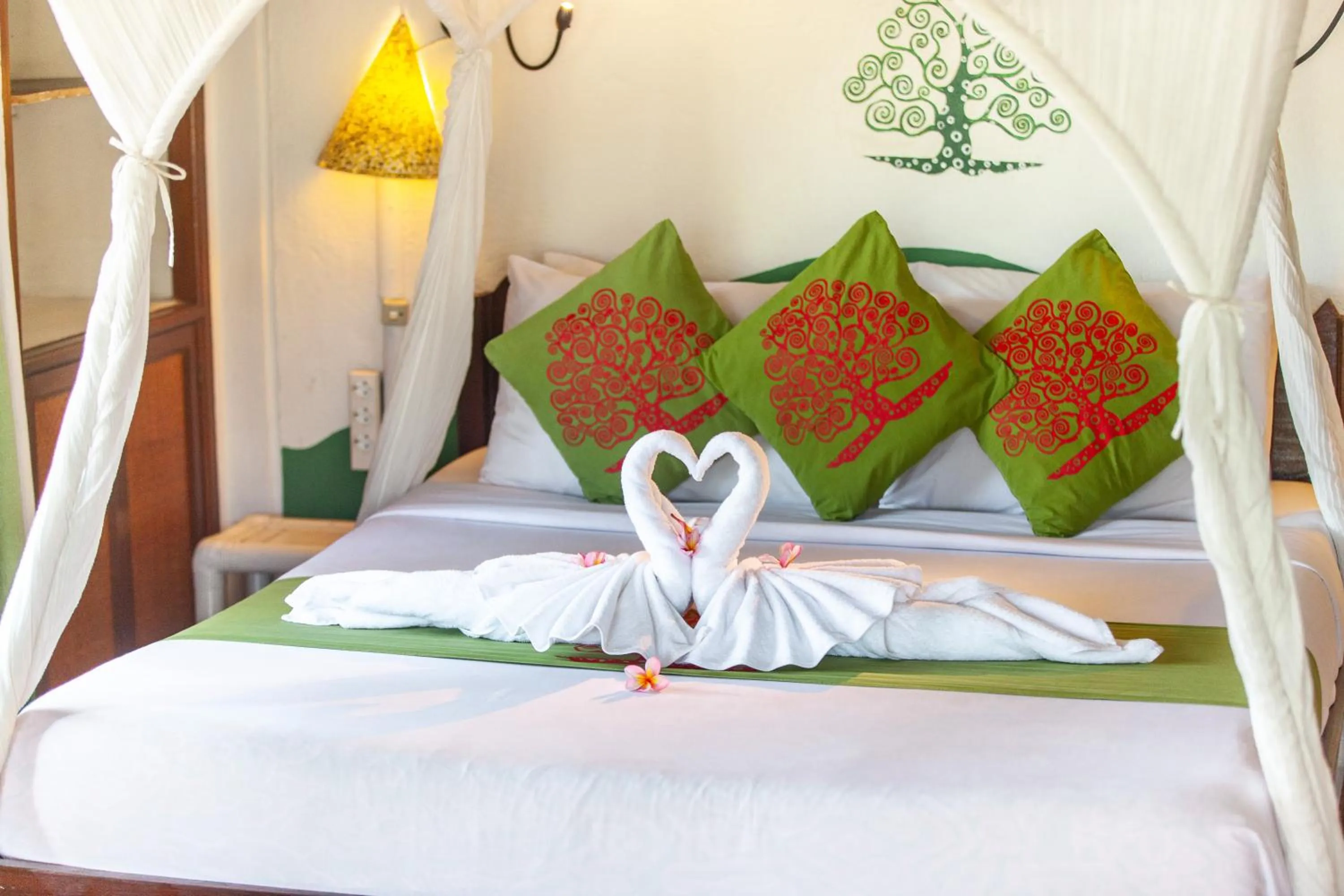 Bed in Swasti Eco Cottages