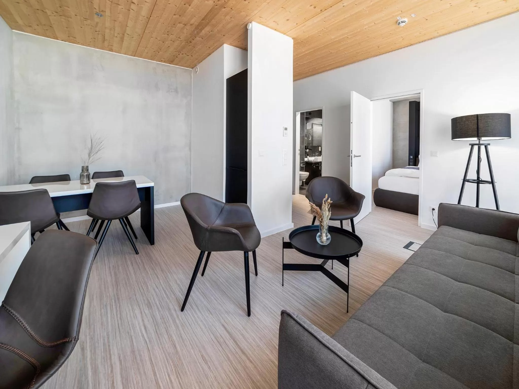 Living room, Bed in DORMERO HoHo Wien