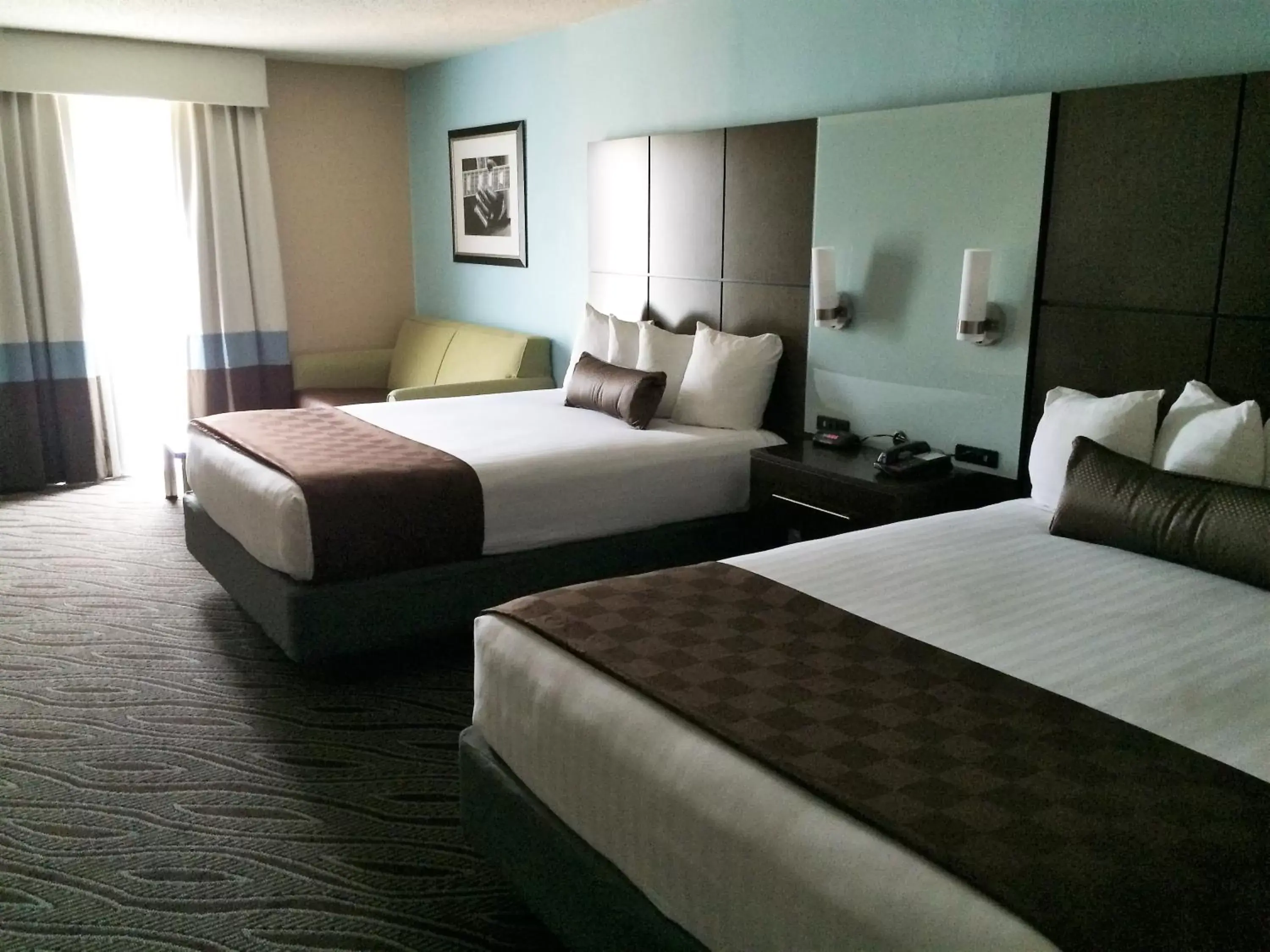 Queen Room with Two Queen Beds with Roll-In Shower in Best Western Plus Galleria Inn & Suites