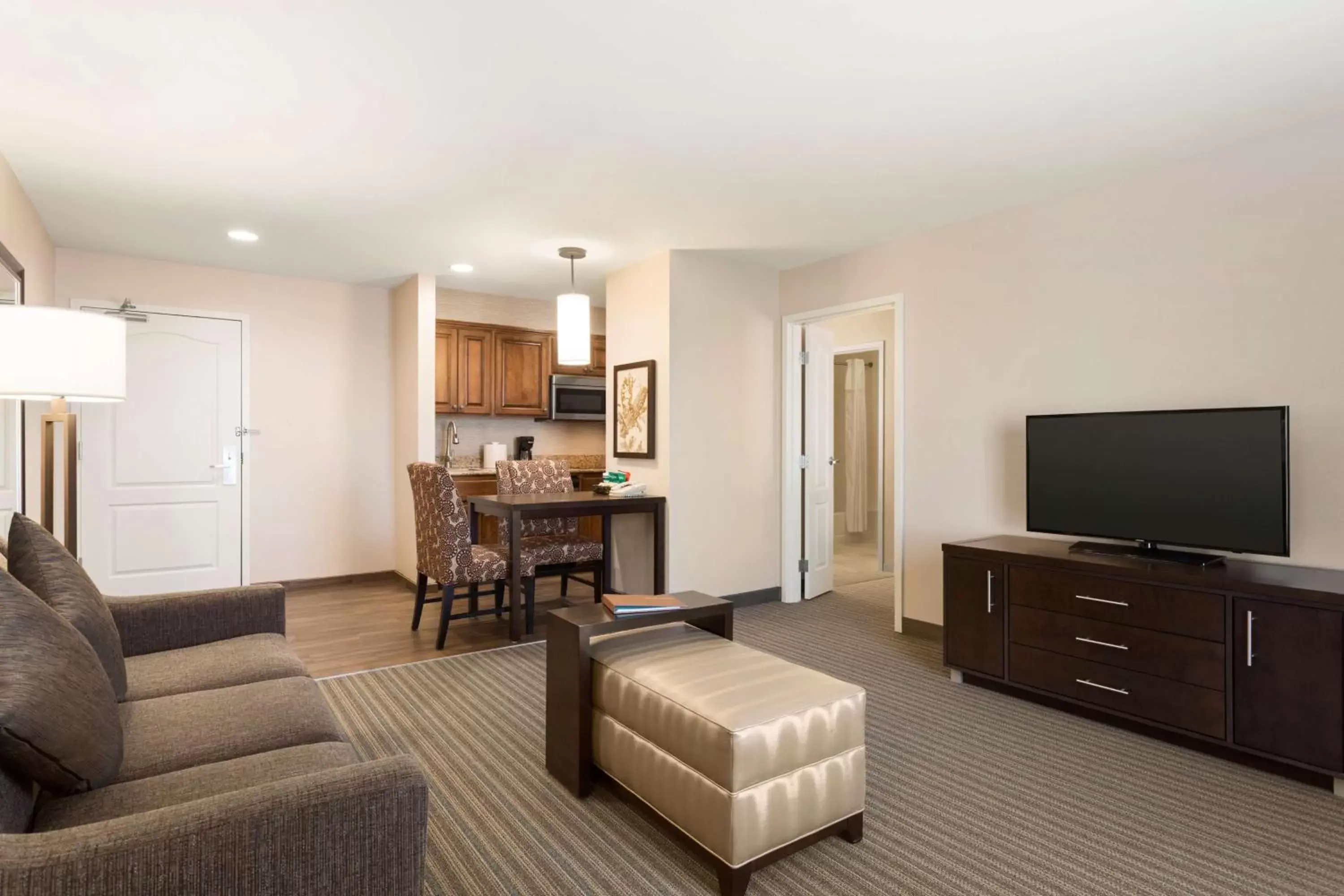 Bed, Seating Area in Homewood Suites by Hilton Fargo