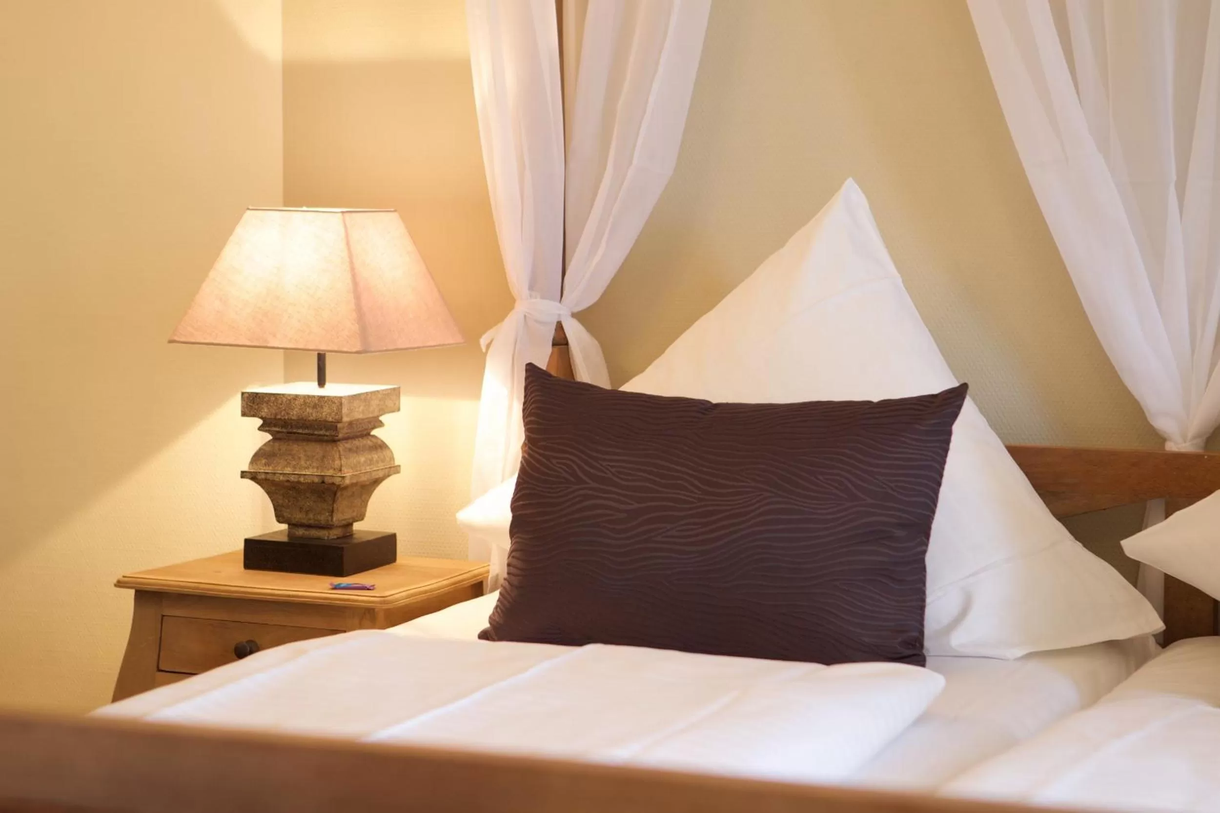 Bed in Das Frühstückshotel Sankt Peter-Ording