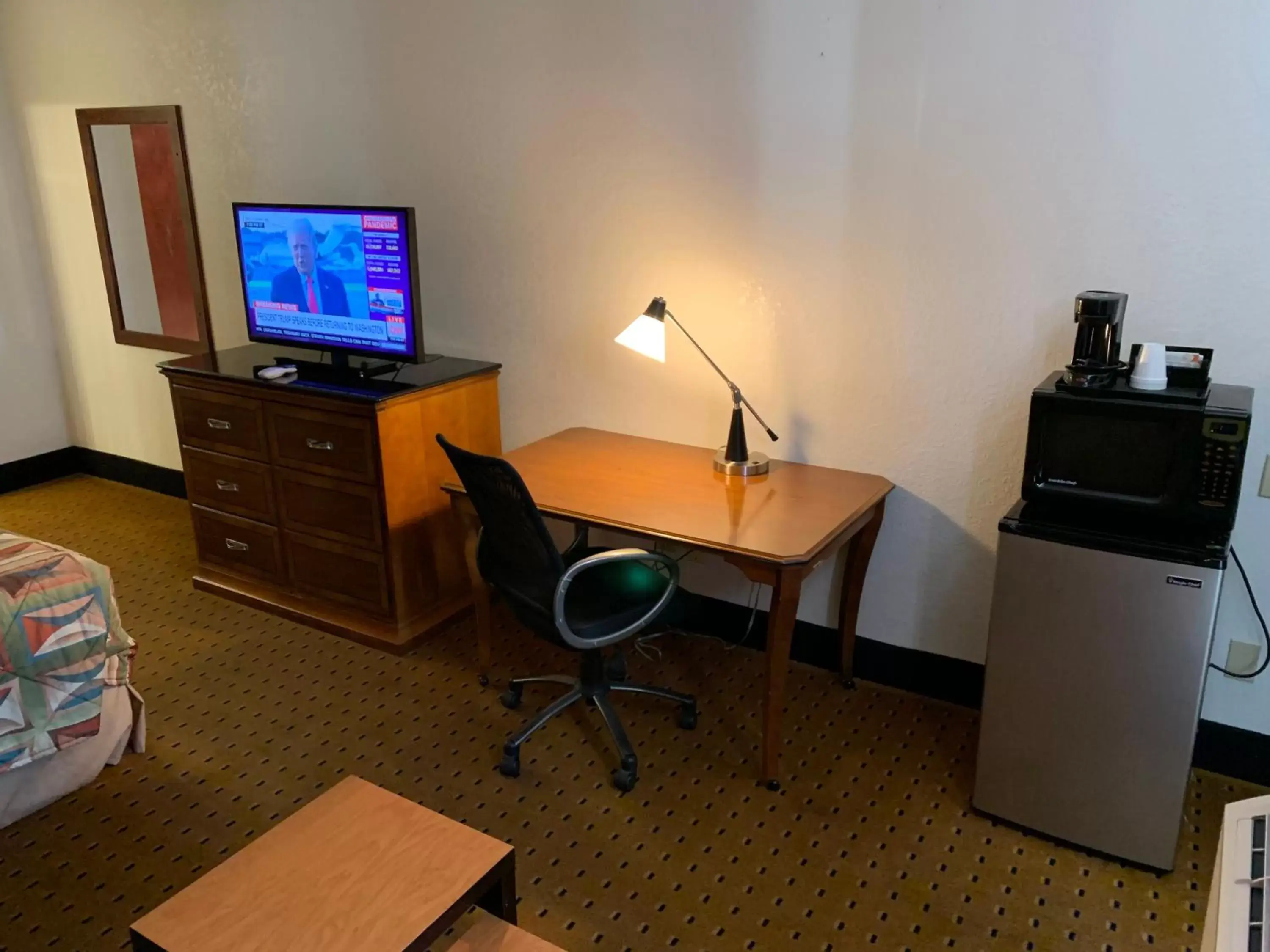 Photo of the whole room, TV/Entertainment Center in Brentwood Inn & Suites