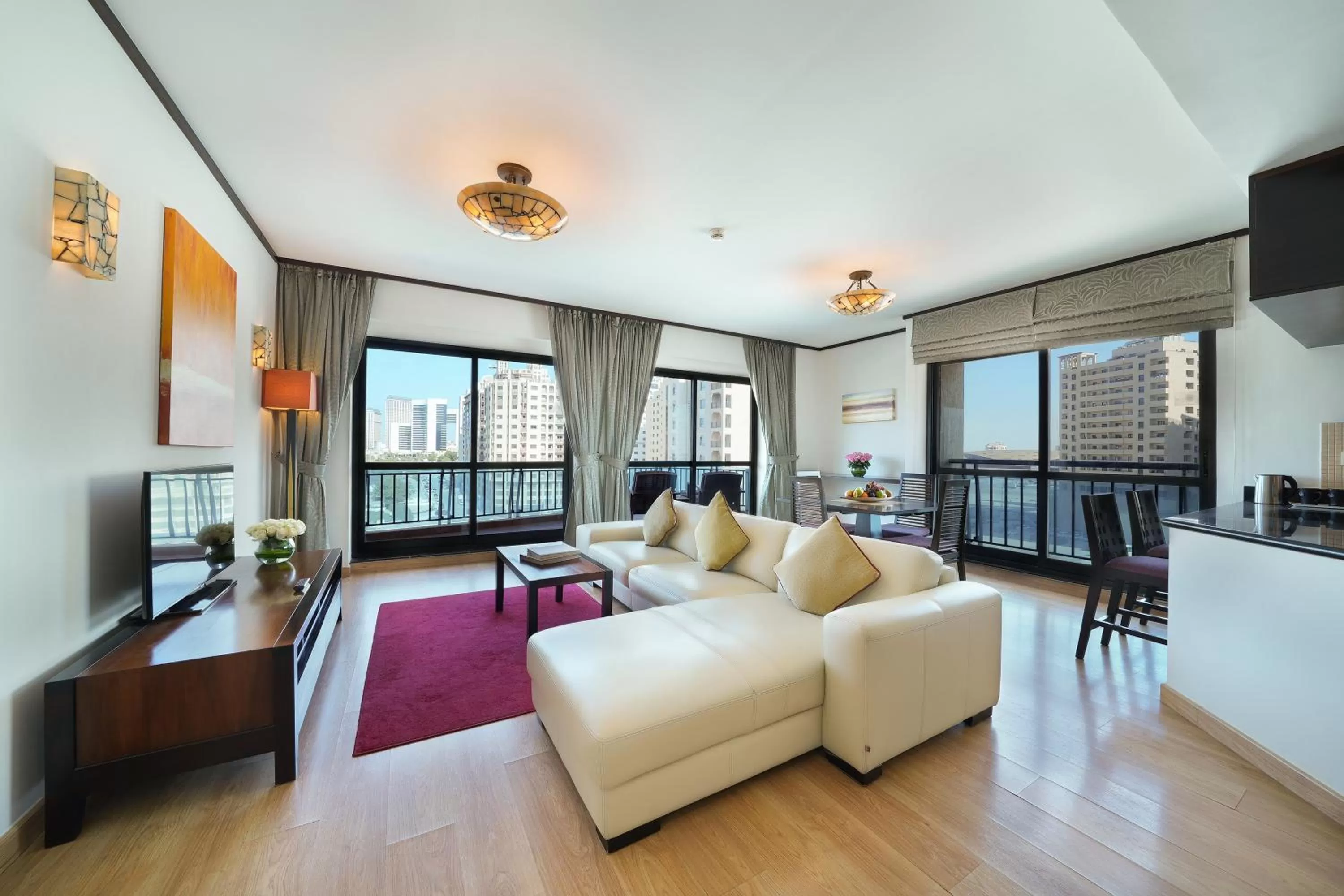 Living room, Bed in Park Apartments Dubai, an Edge By Rotana Hotel