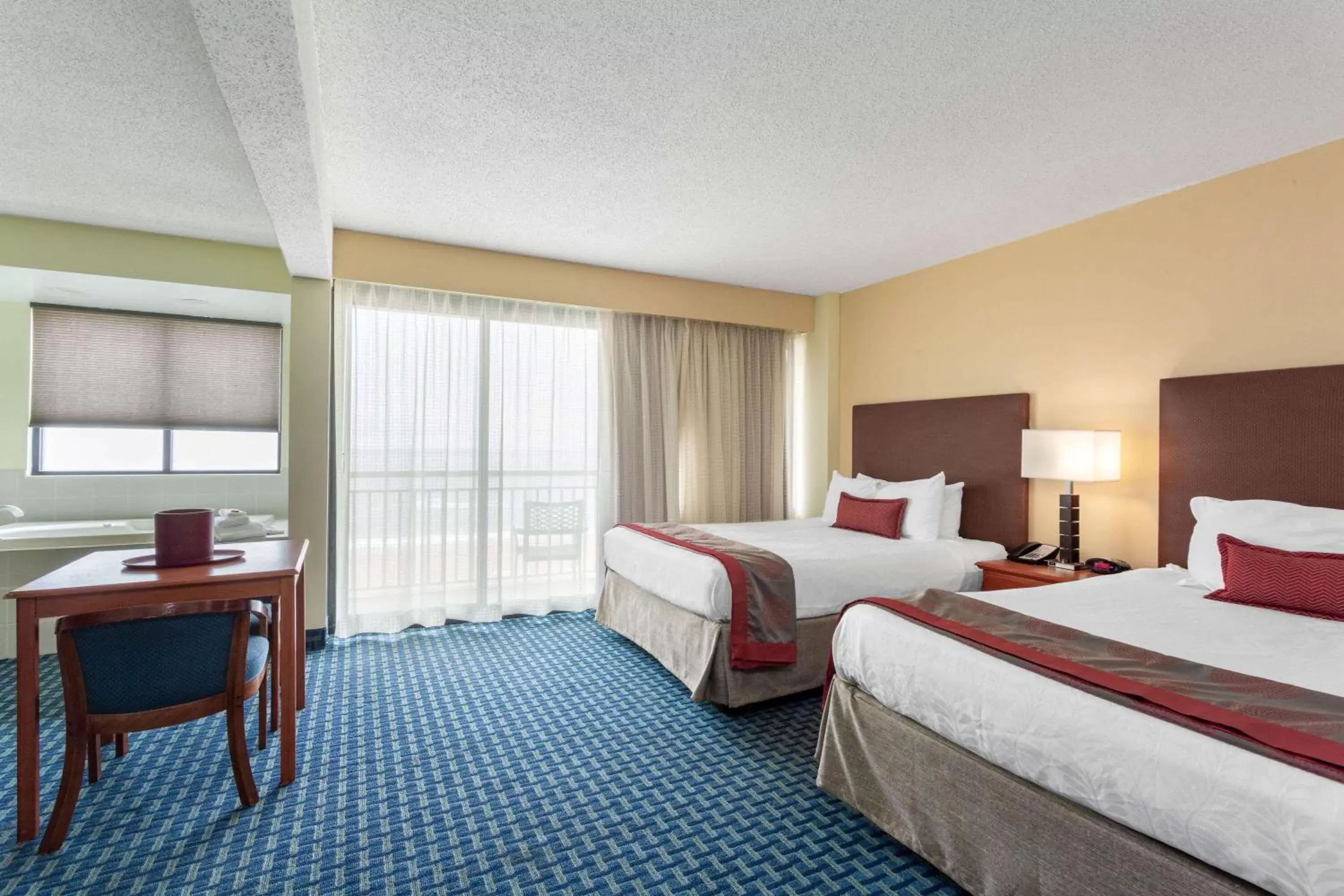 Photo of the whole room, Bed in Ramada Plaza by Wyndham Virginia Beach