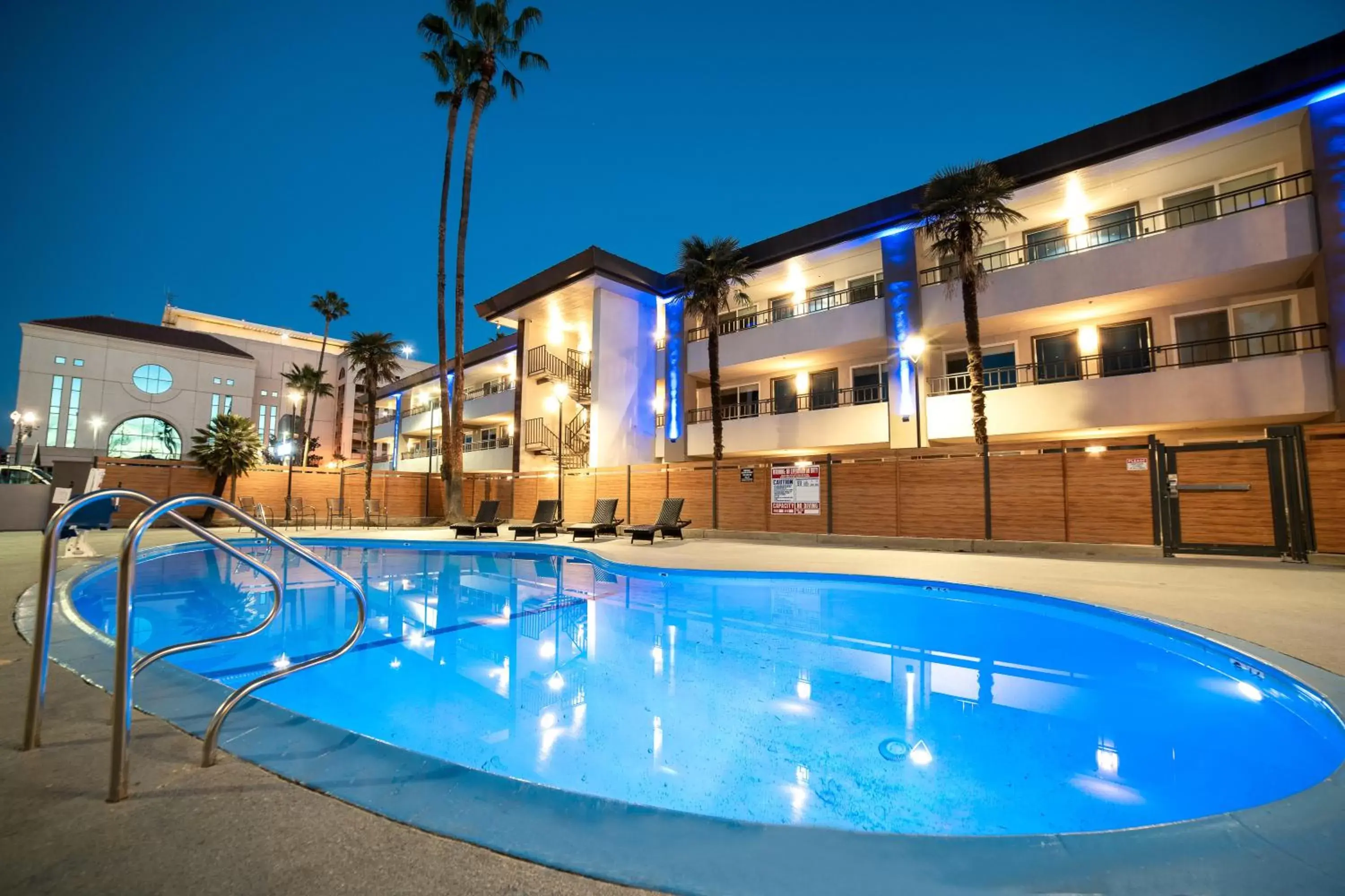 Property building, Swimming Pool in Studio 6 Suites Stockton, CA Waterfront