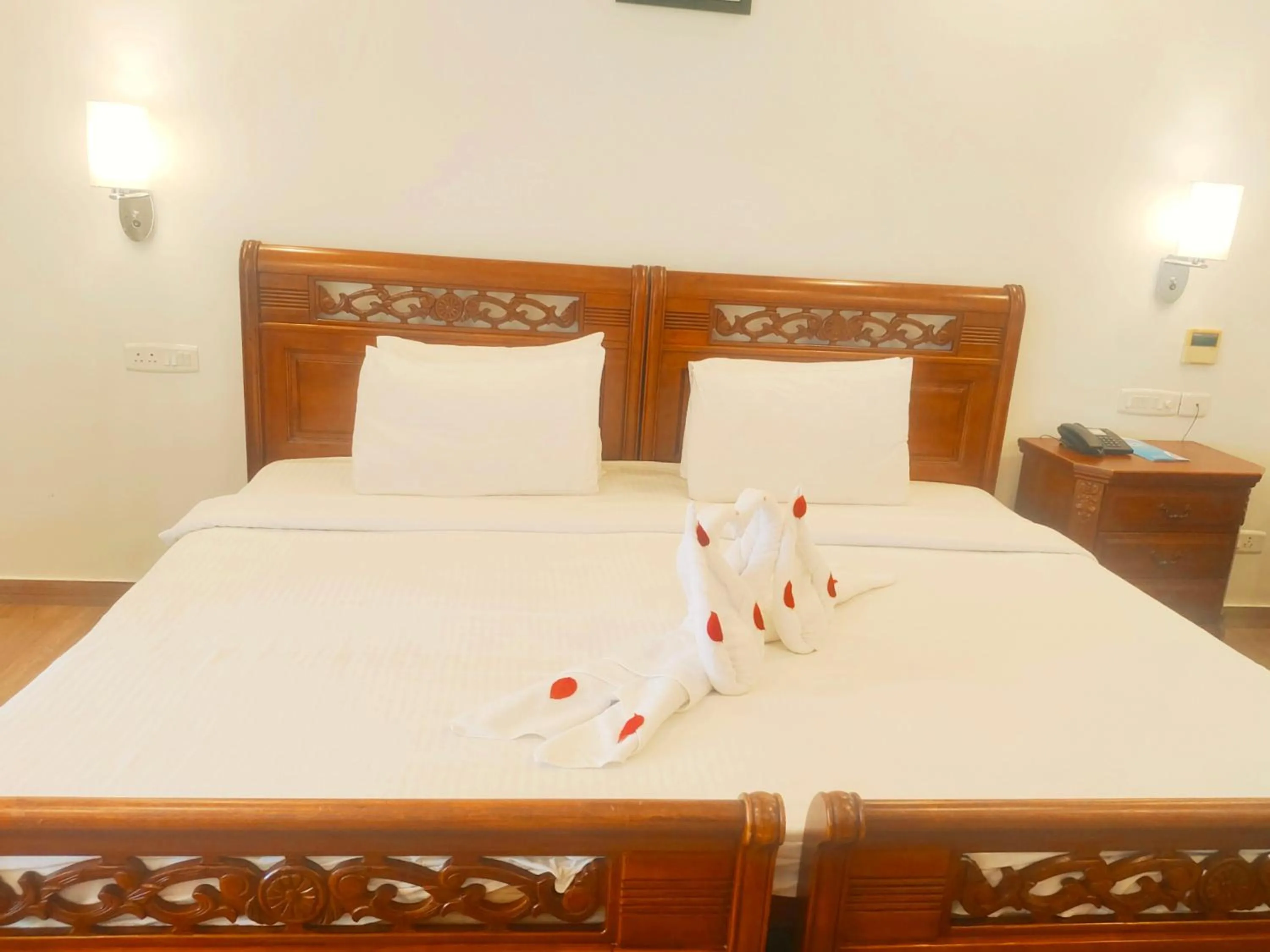 Bed in The Travancore Heritage Beach Resort