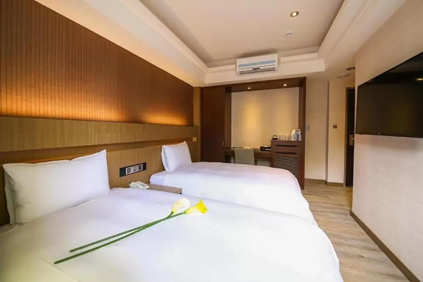 Photo of the whole room, Bed in Talmud Hotel Tainan