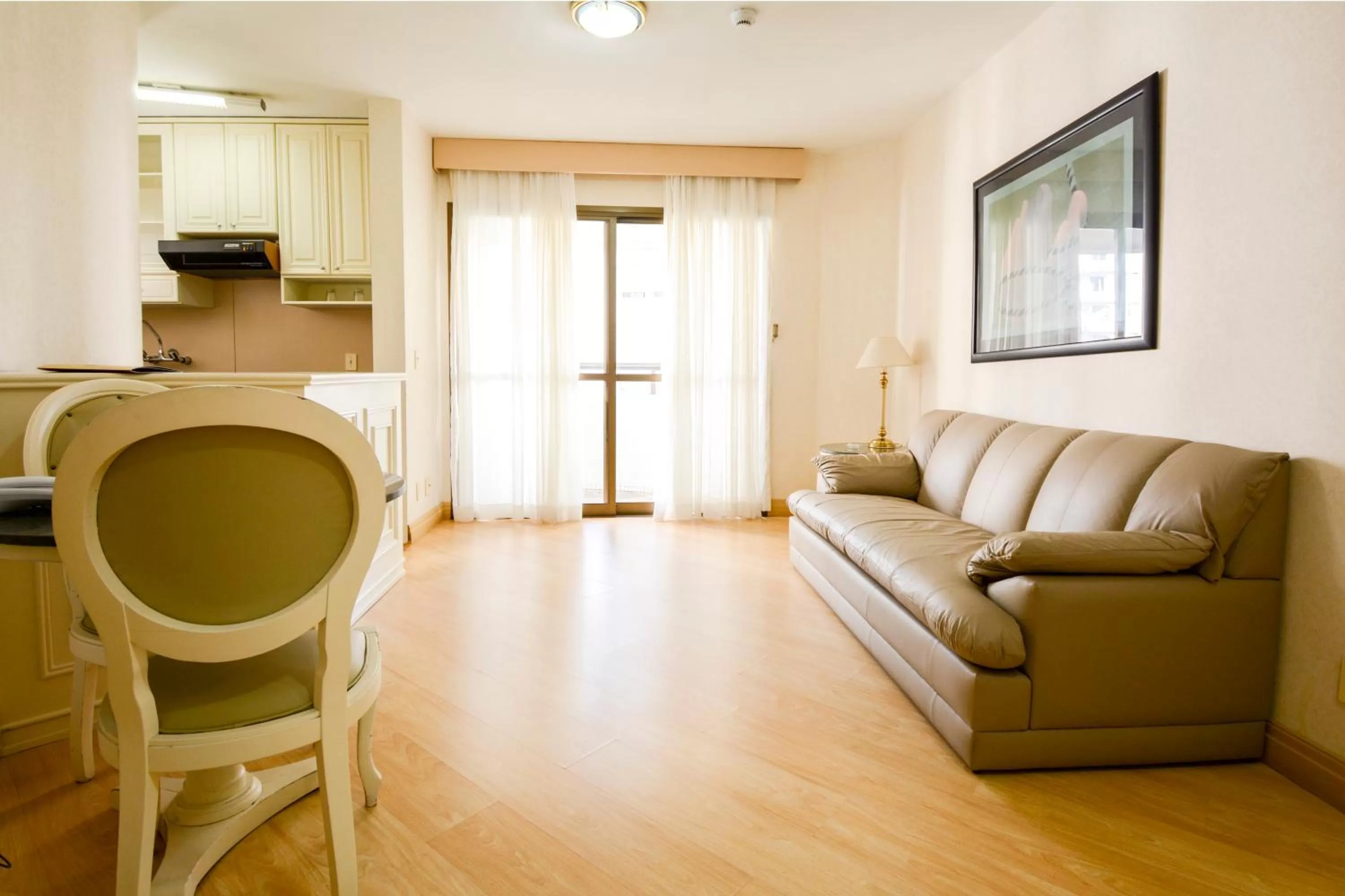 Living room, Seating Area in Wall Street Apartments by BnbHost