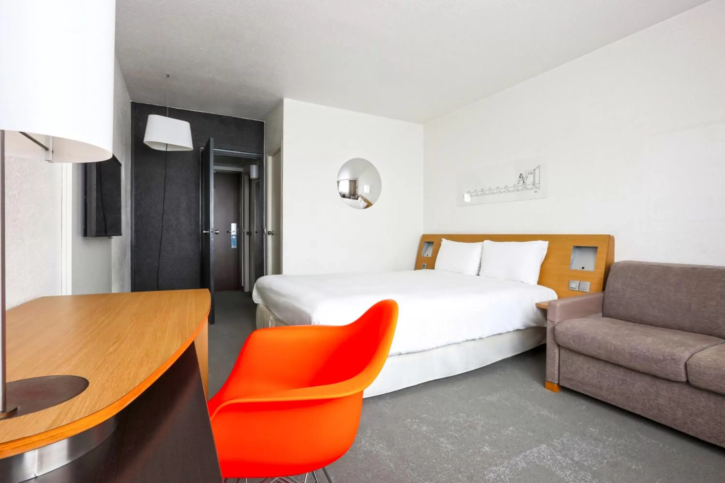 Bed, Seating Area in ibis Styles Nancy Sud