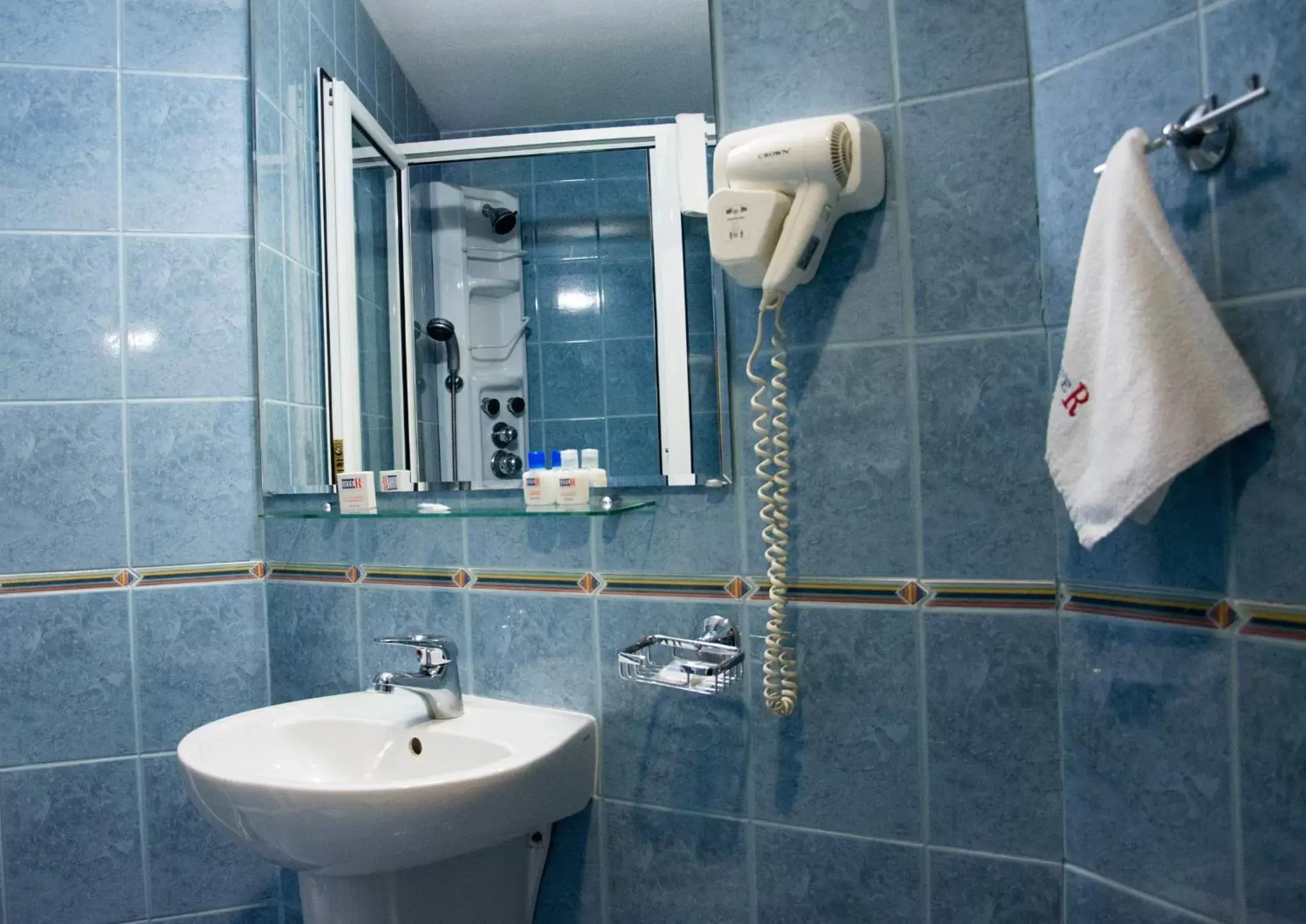 Bathroom in DITER Family Hotel