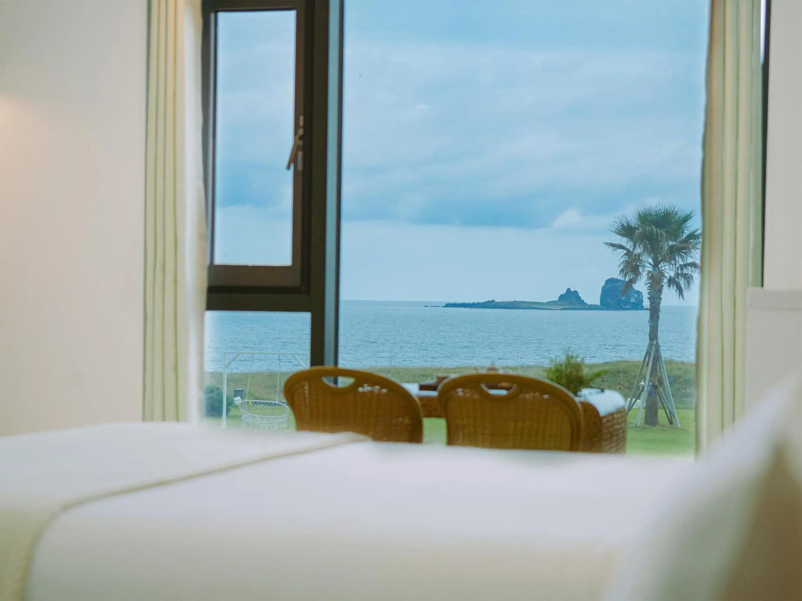 Bed, Sea View in Sun And Moon Resort