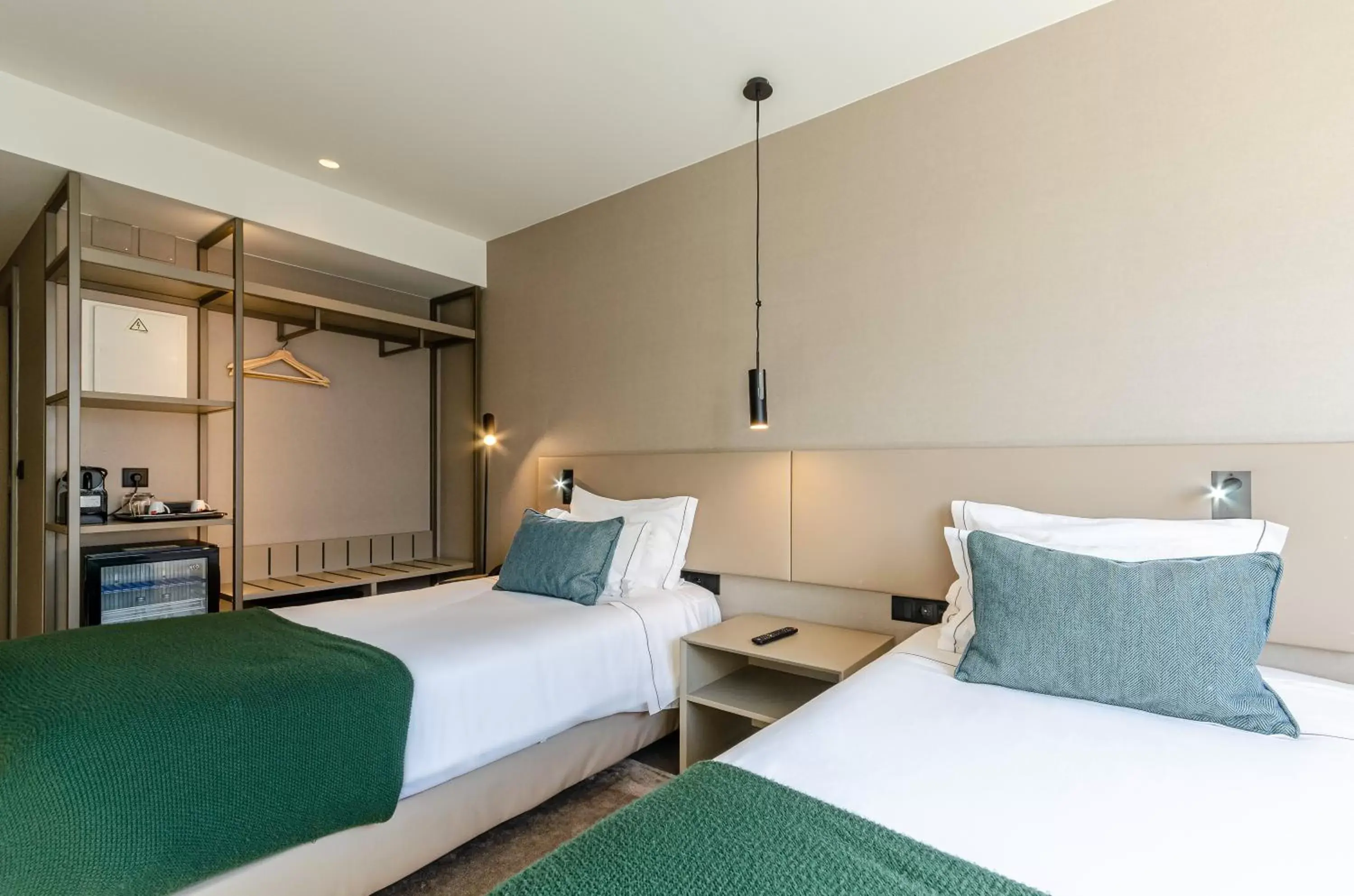 Bed in OMID Saldanha Hotel