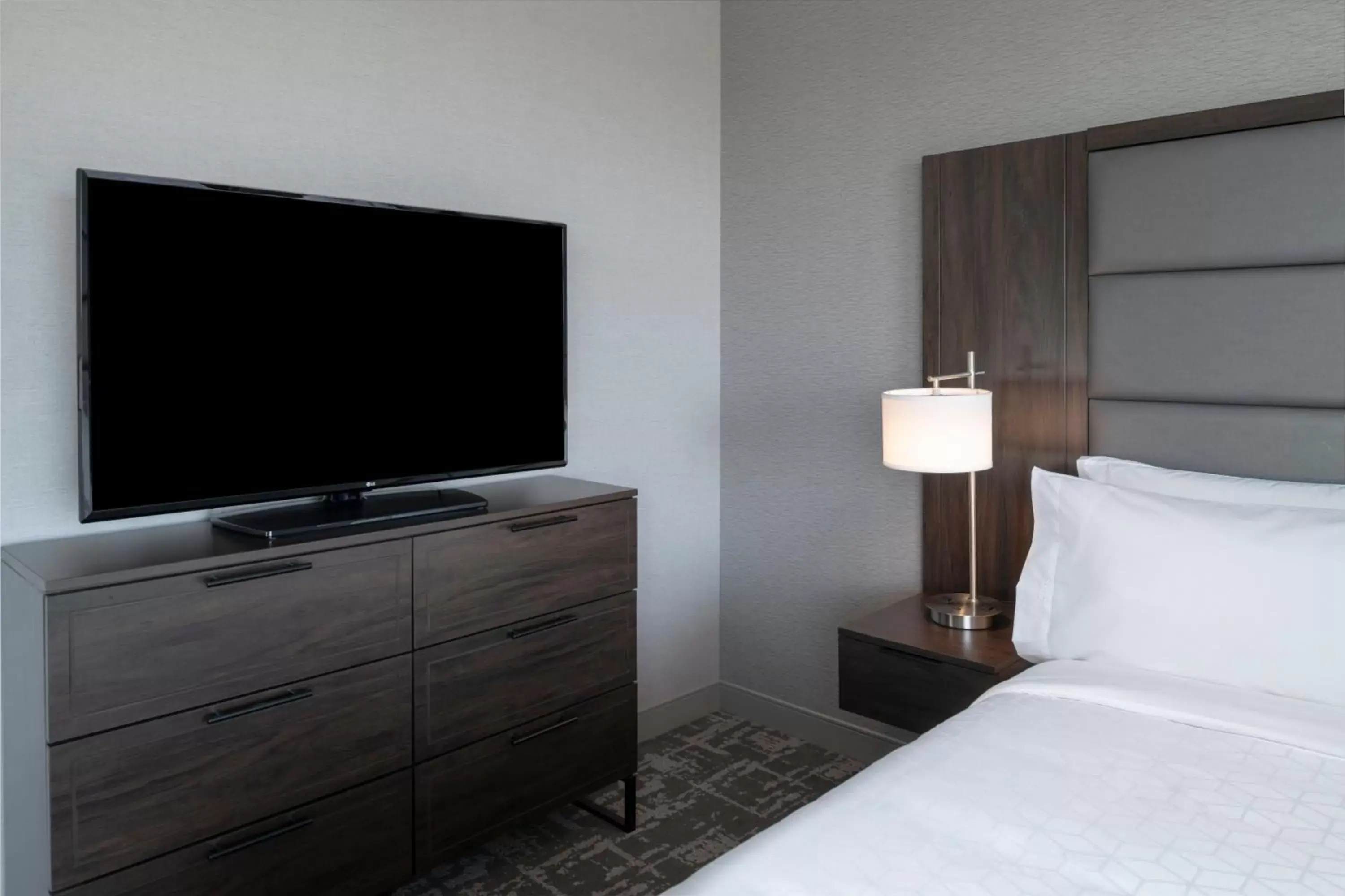 Bedroom, TV/Entertainment Center in Staybridge Suites - Boston Logan Airport - Revere, an IHG Hotel