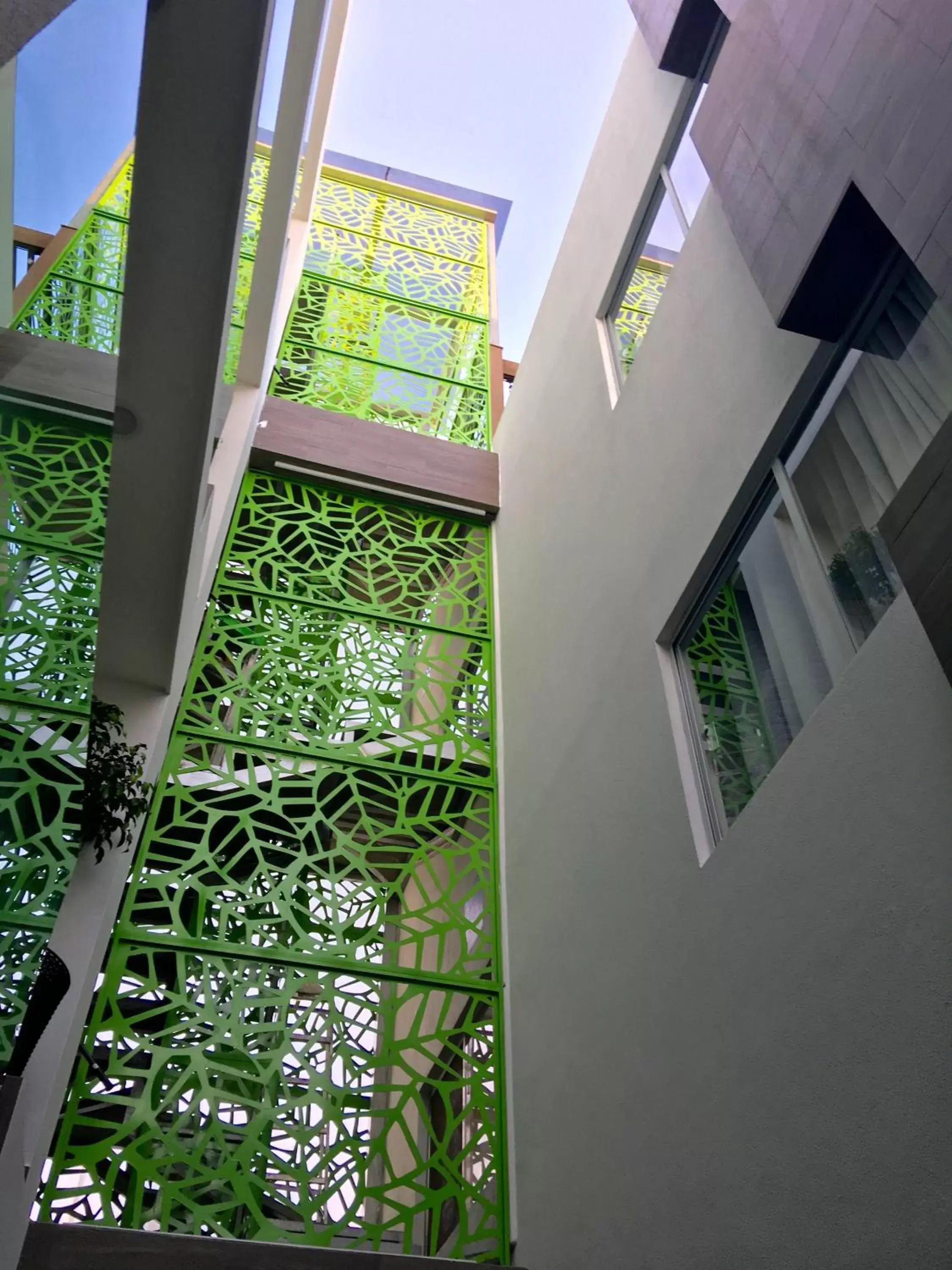 Property building, Balcony/Terrace in Herbal Inn Suites