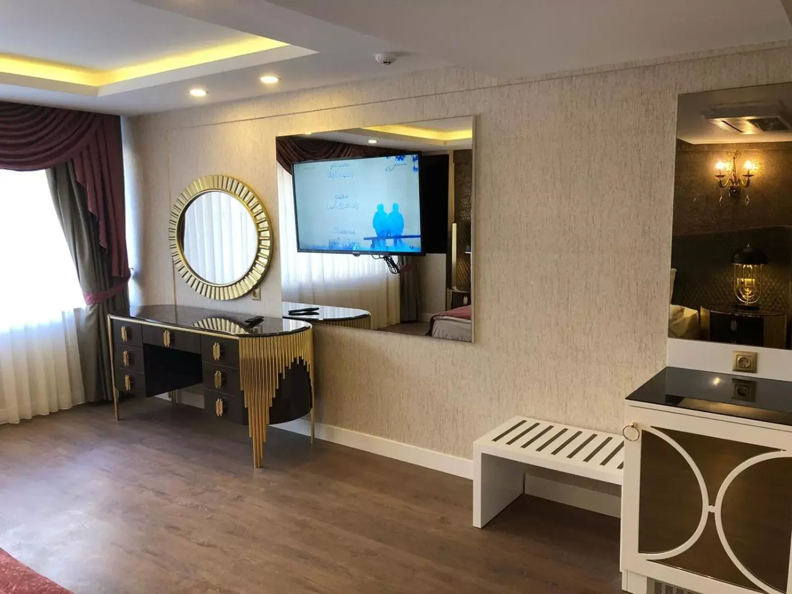 Communal lounge/ TV room, TV/Entertainment Center in Burj Al Istanbul