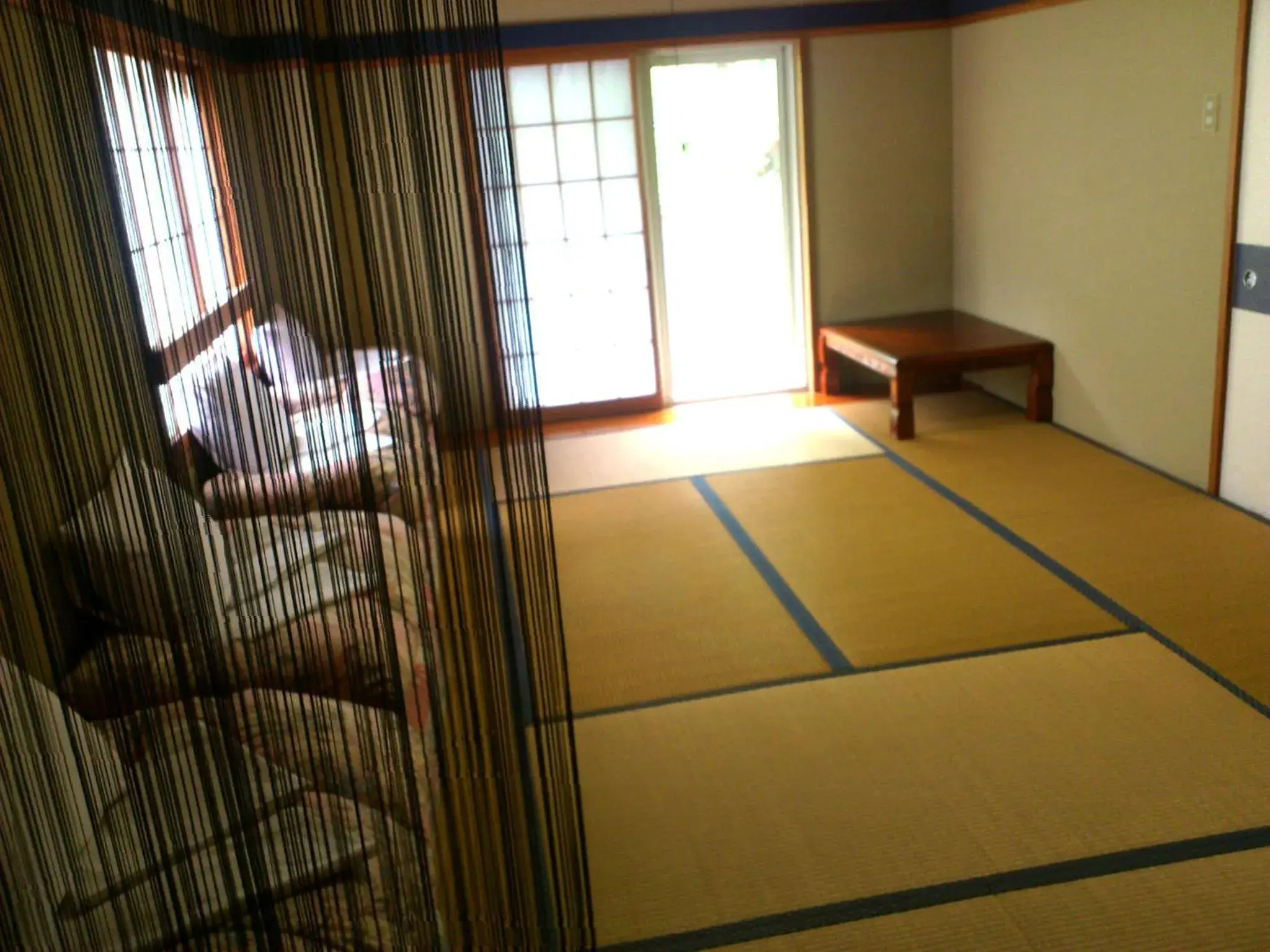 Photo of the whole room, Bed in Tenjin Lodge