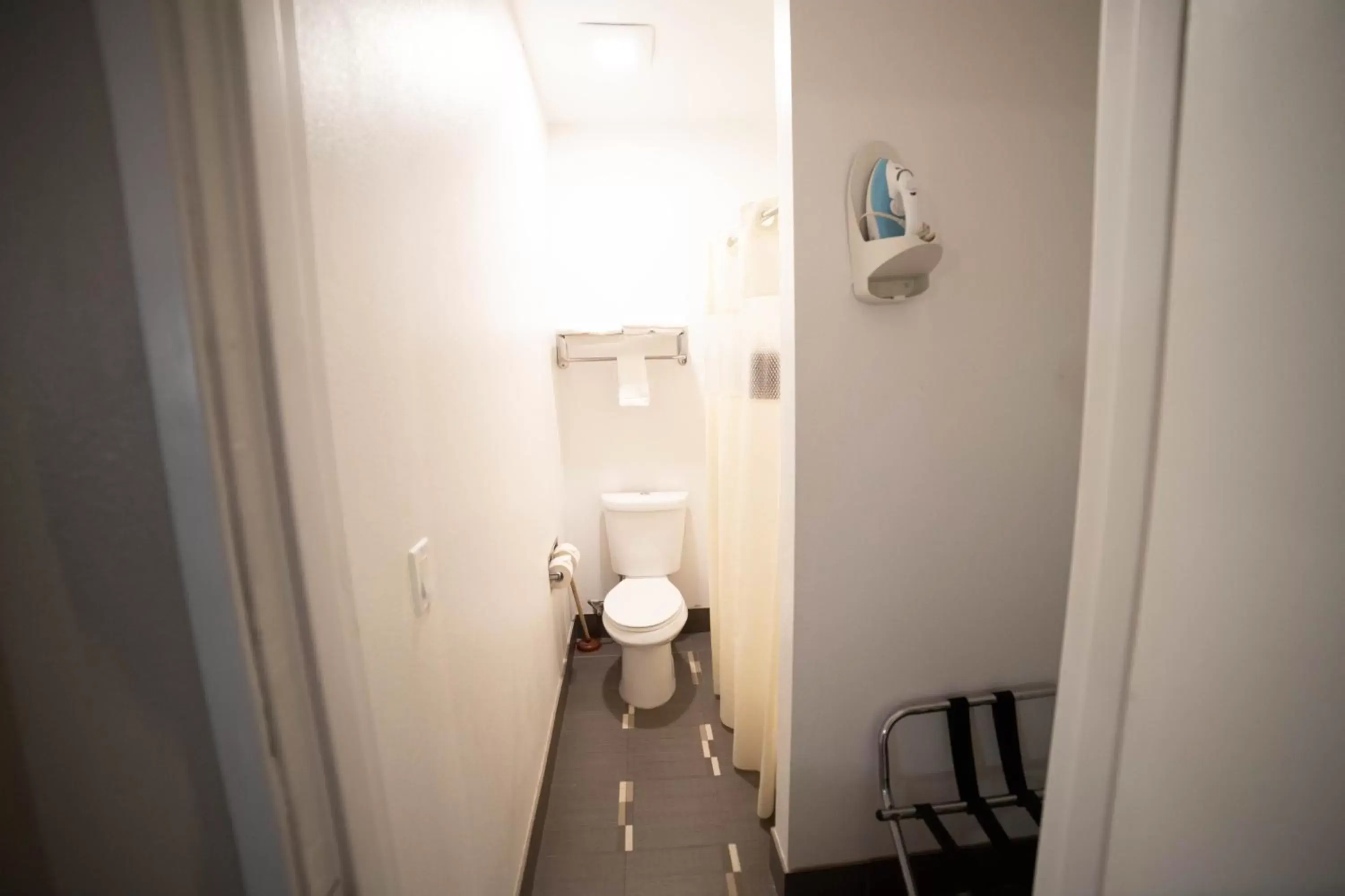 Toilet, Bathroom in Mid City Inn & Suites Pico Rivera