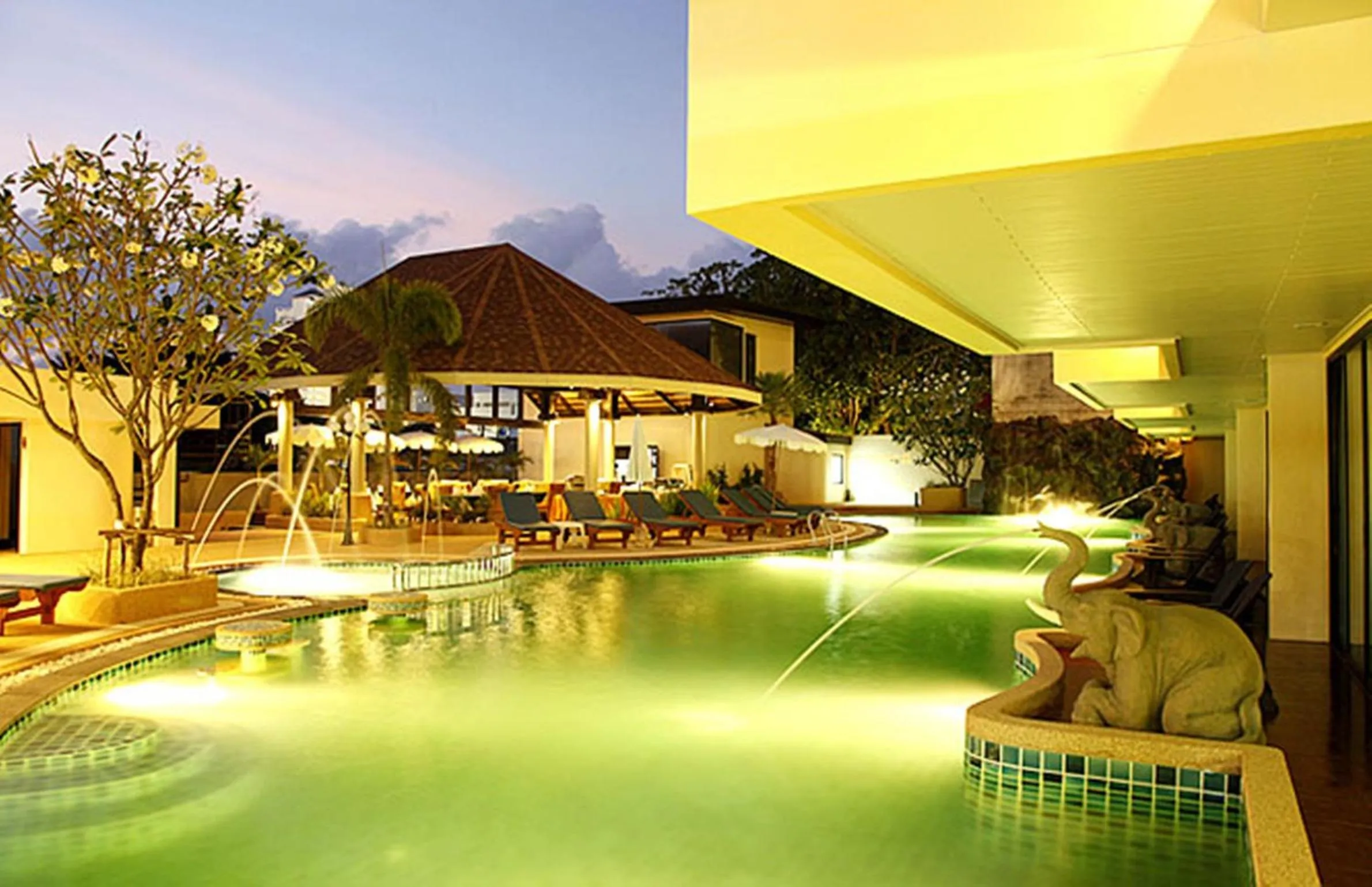 Swimming pool in Palmyra Patong Resort Phuket - SHA Extra Plus