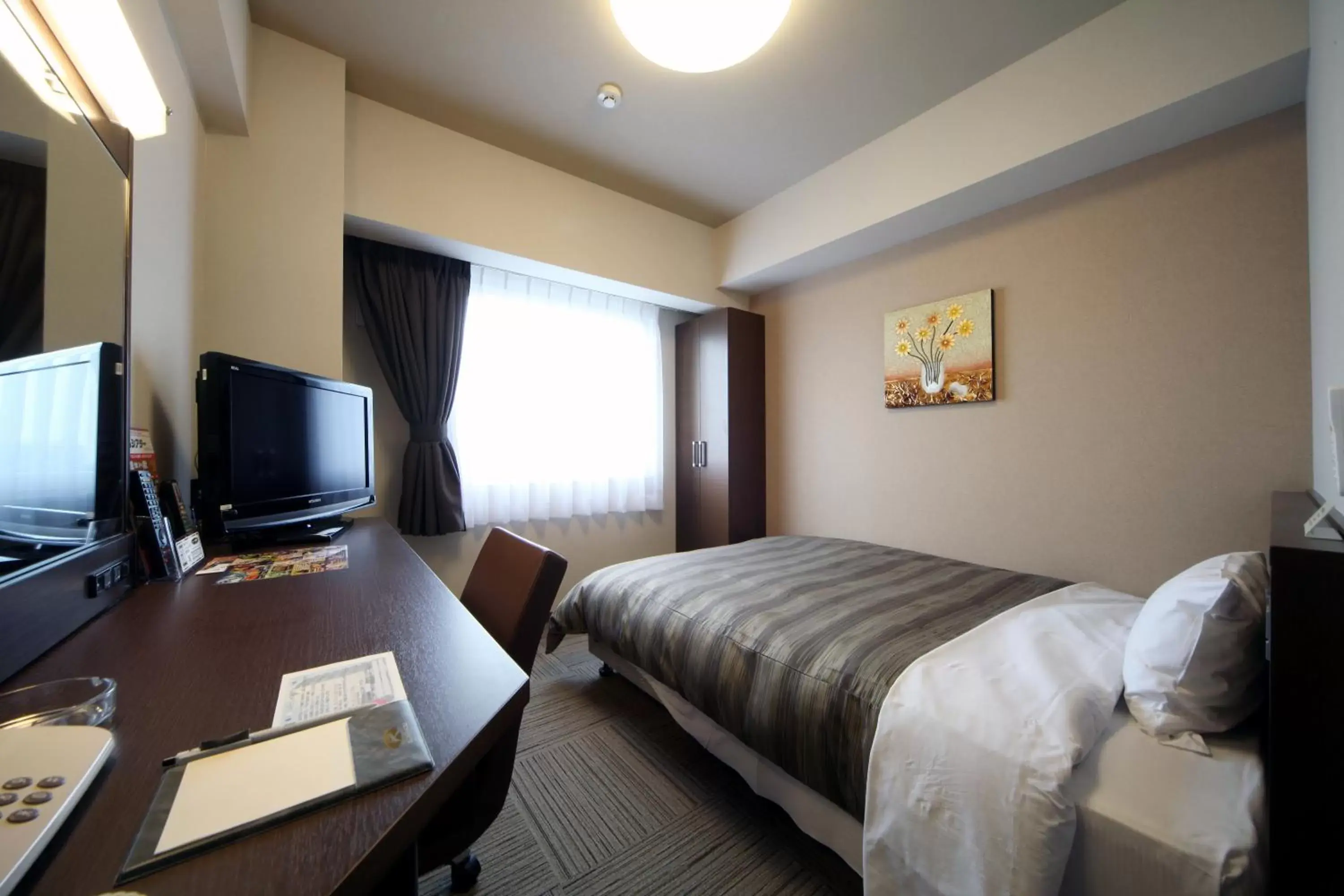 Photo of the whole room, TV/Entertainment Center in Hotel Route-Inn Marugame