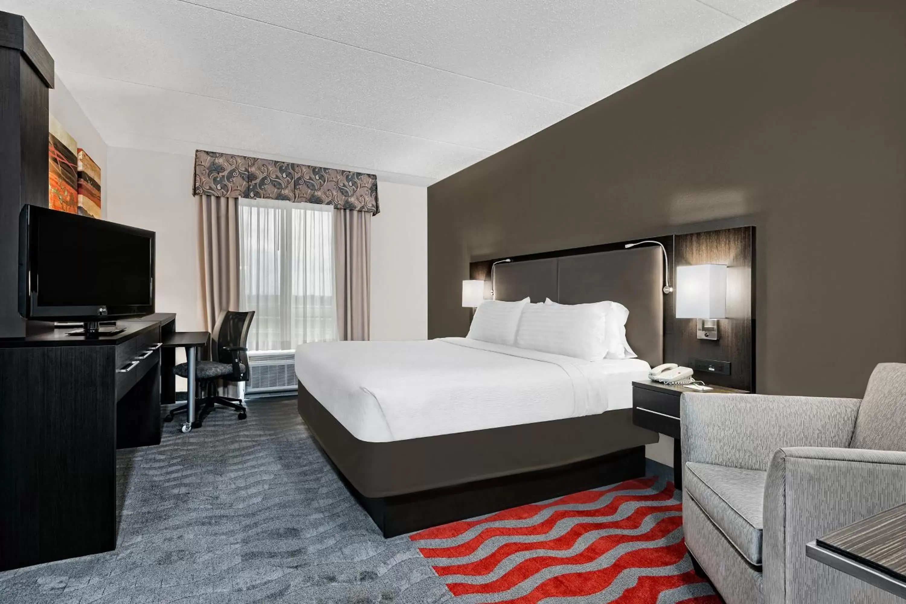 Photo of the whole room, Bed in Holiday Inn & Suites College Station-Aggieland, an IHG Hotel