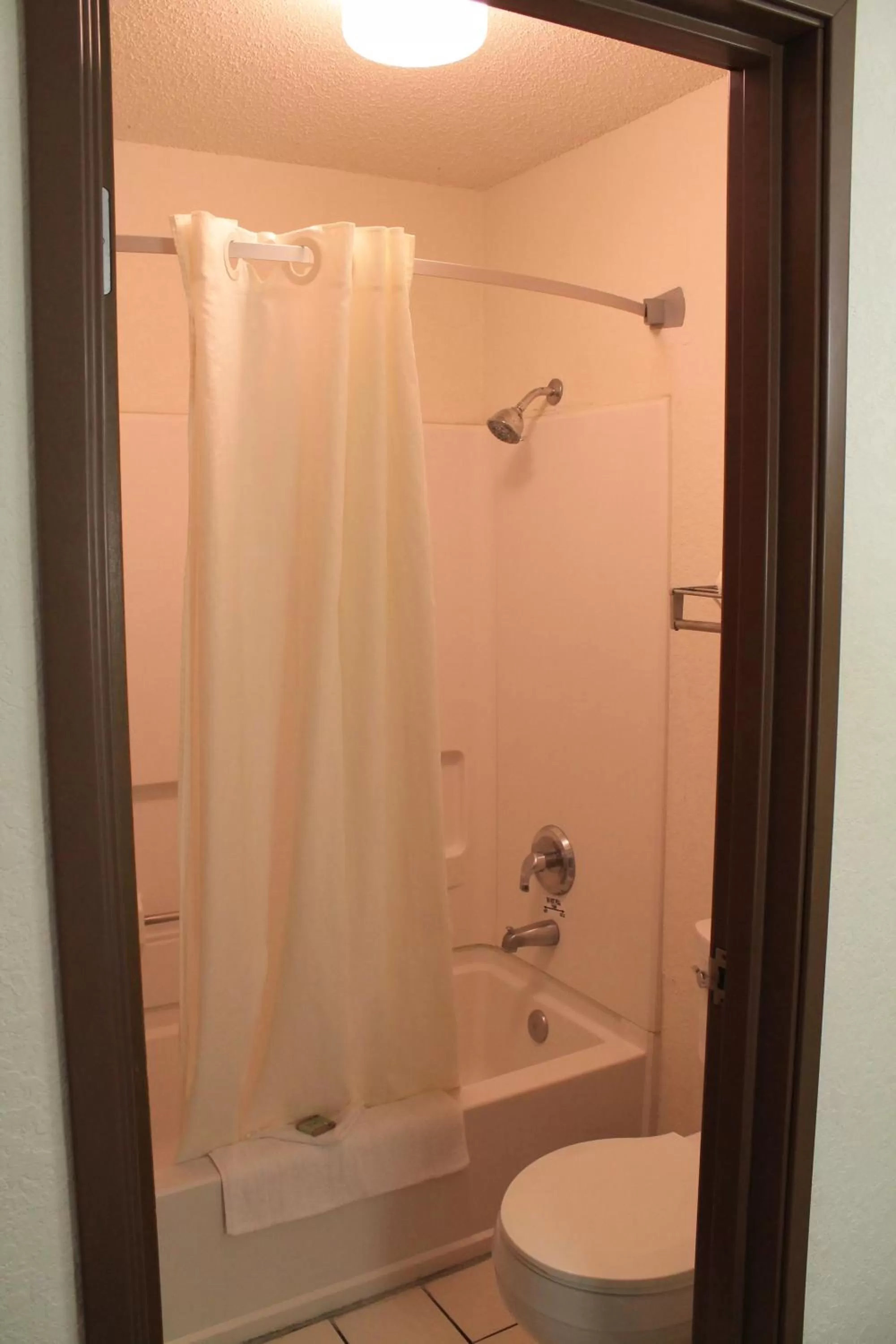 Bathroom in Super 8 by Wyndham San Antonio/Fiesta