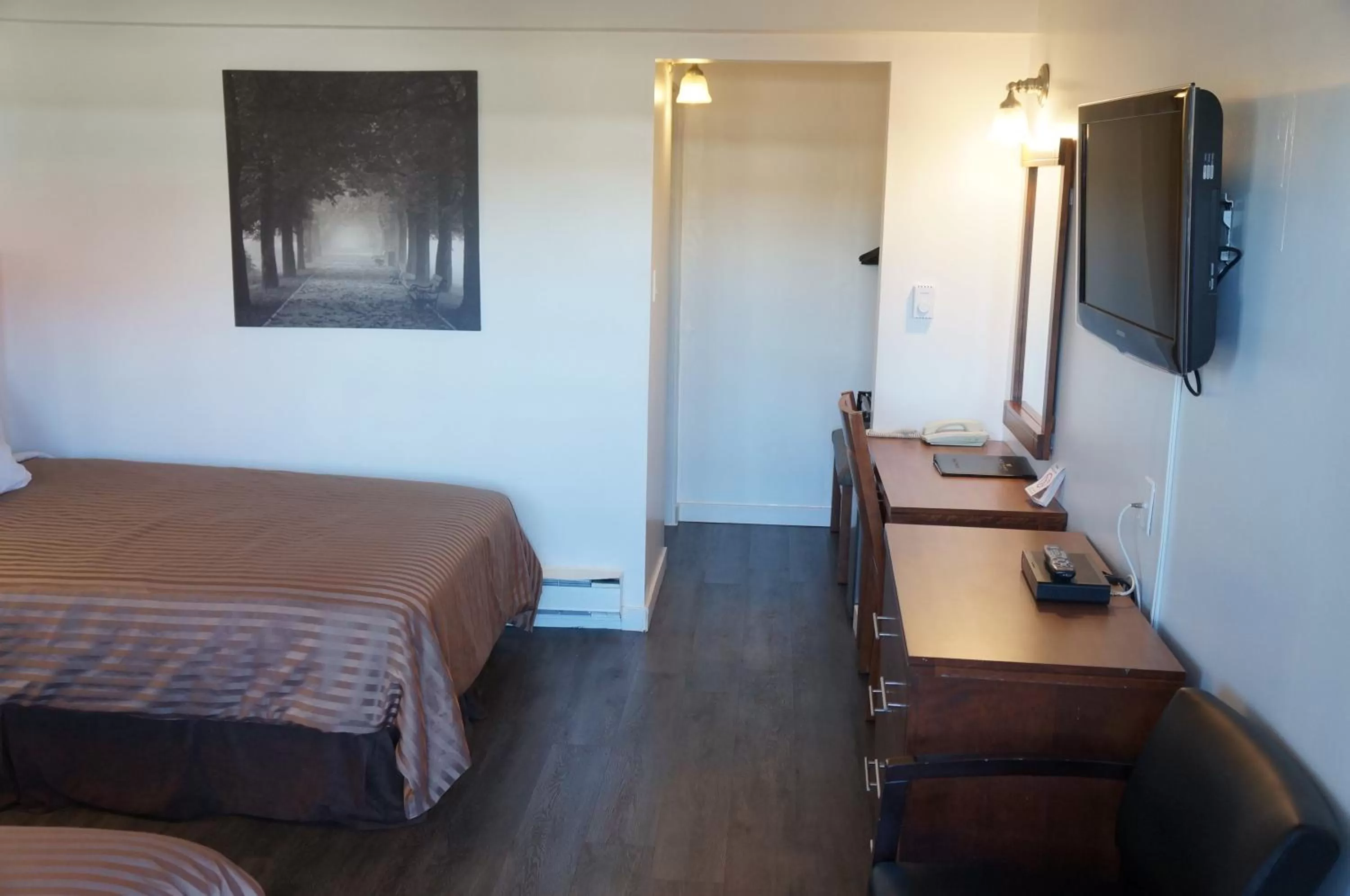 Bed in Westward Inn & Suites