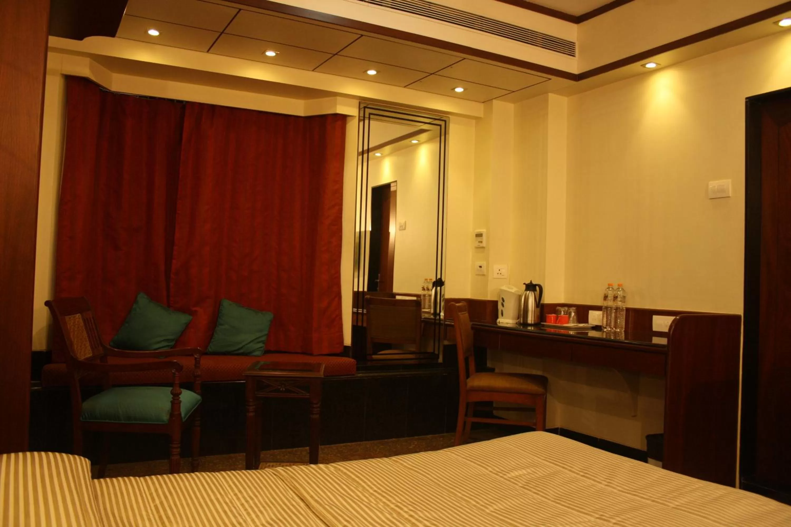 Bed in Hotel Karl Residency