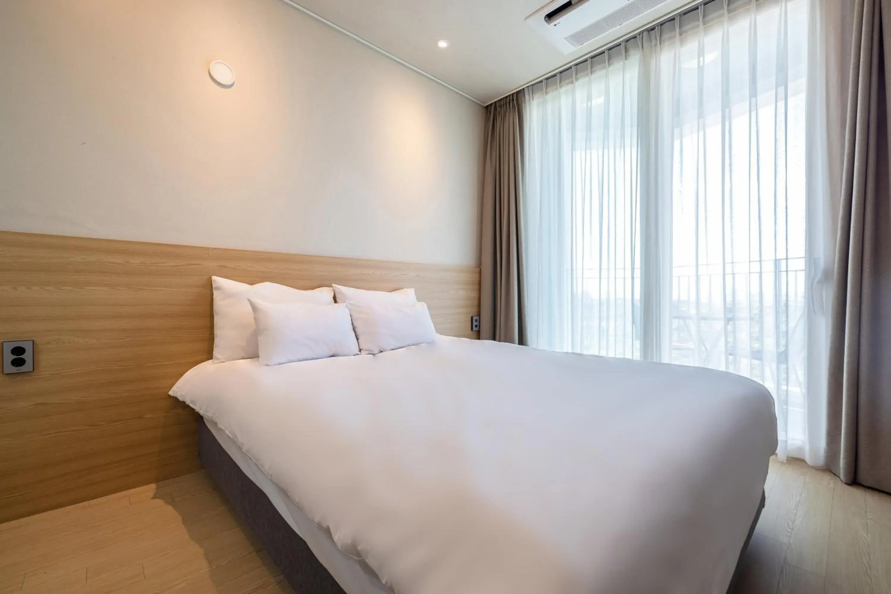 Bed in Ocean Soleview Hotel