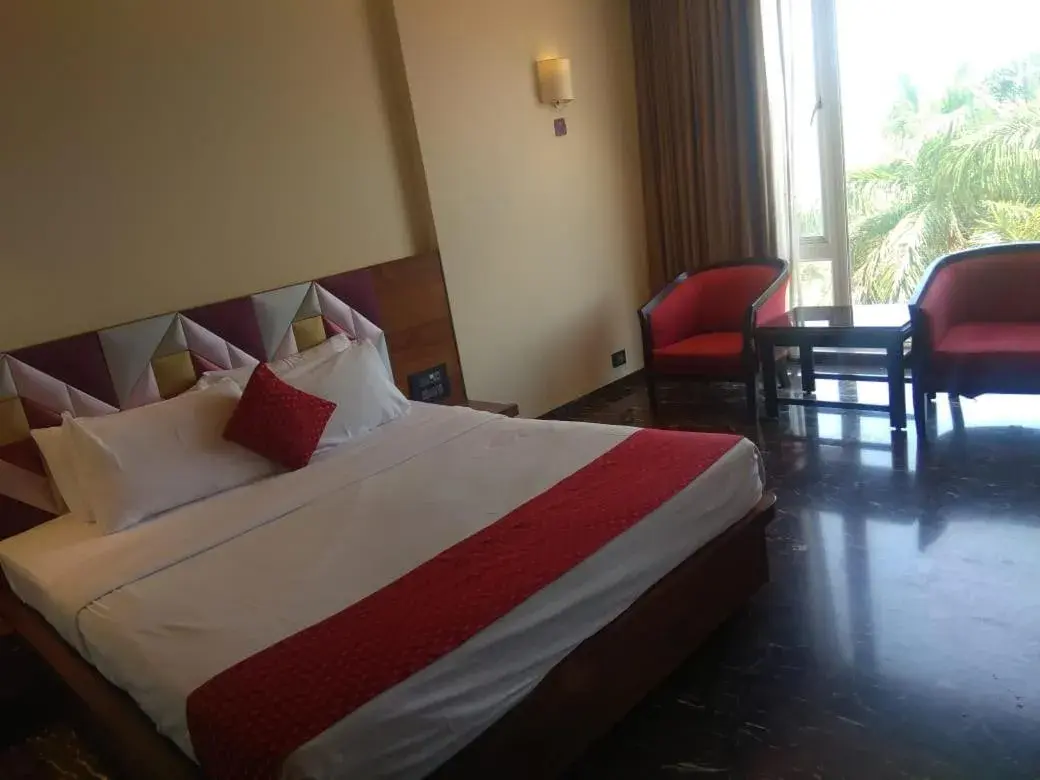 Bed in Quality Inn Regency, Nashik