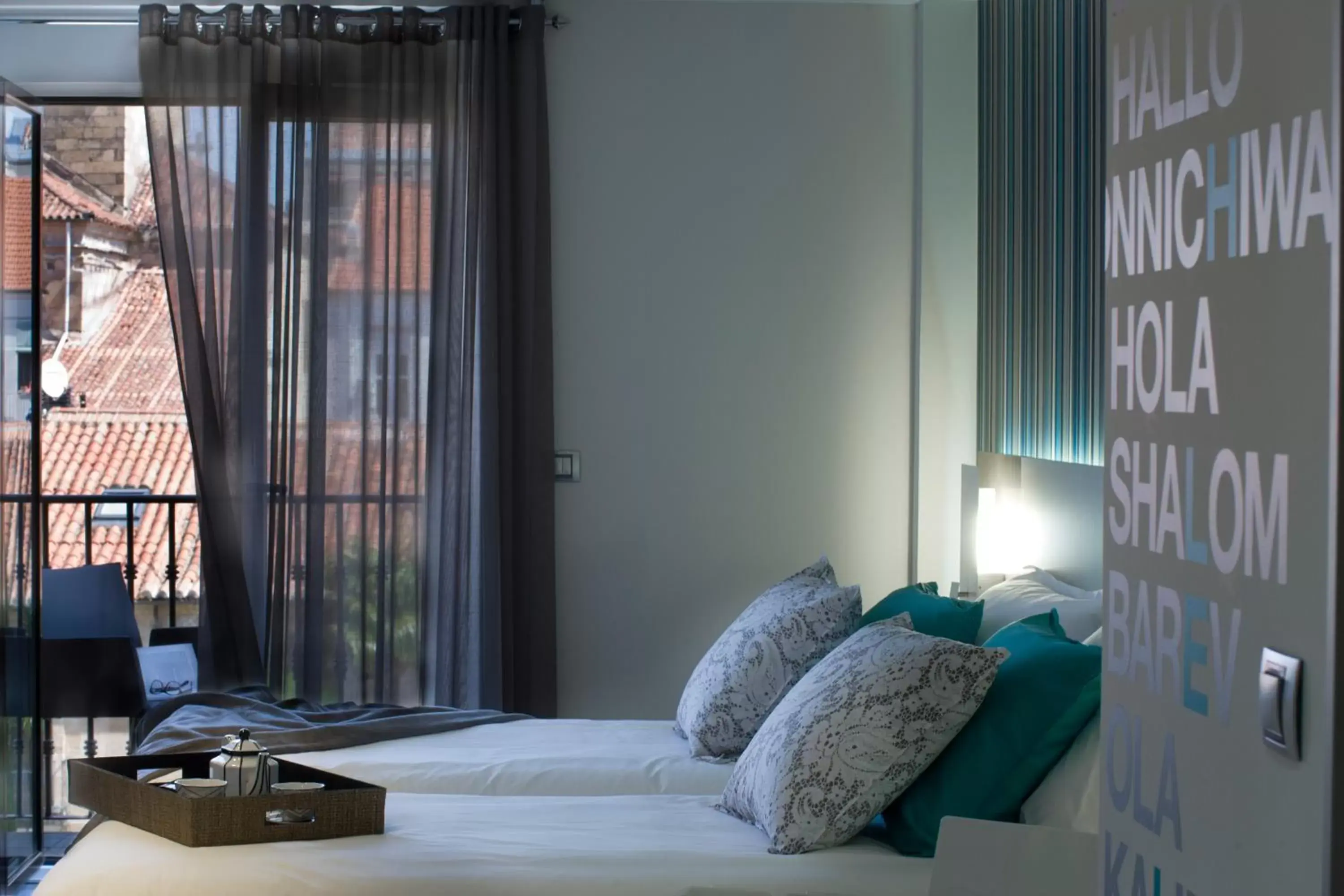 Decorative detail, Bed in Salamanca Suite Studios Decorative detail, Bed in Salamanca Suite Studios