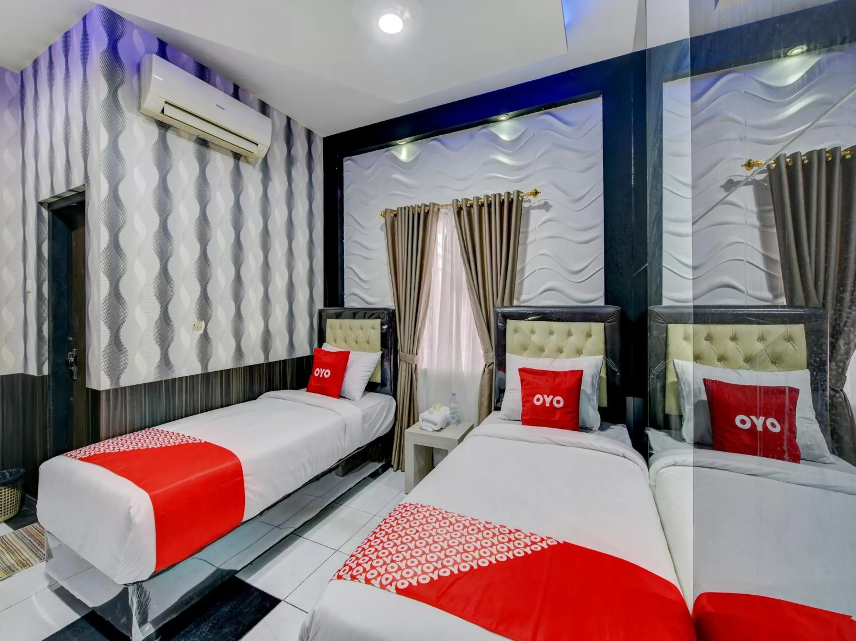 Bedroom in SUPER OYO 4010 Zaara Guest House Syariah