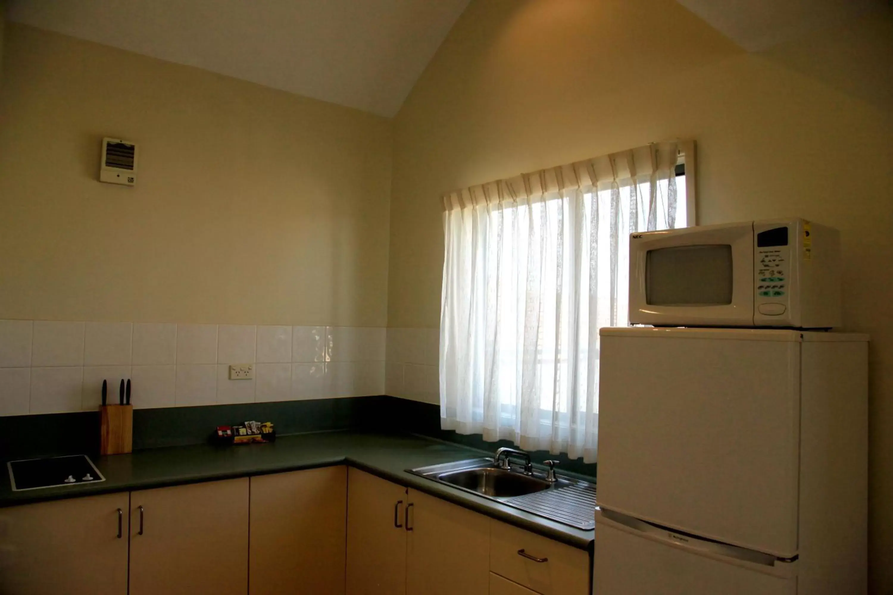 Kitchen or kitchenette, Kitchen/Kitchenette in Travellers Motor Village