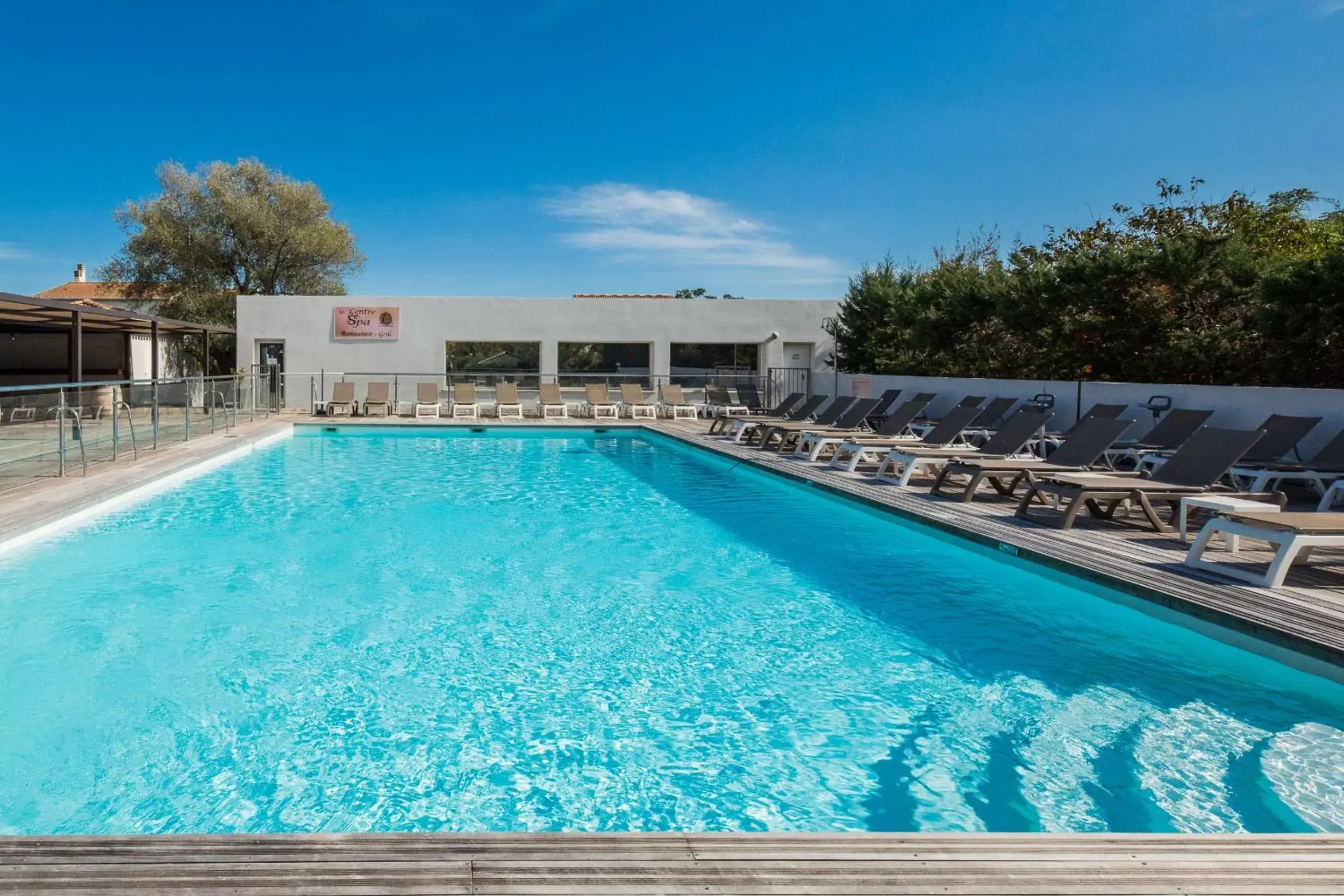 Swimming Pool in Hôtel Spa Restaurant La Madrague