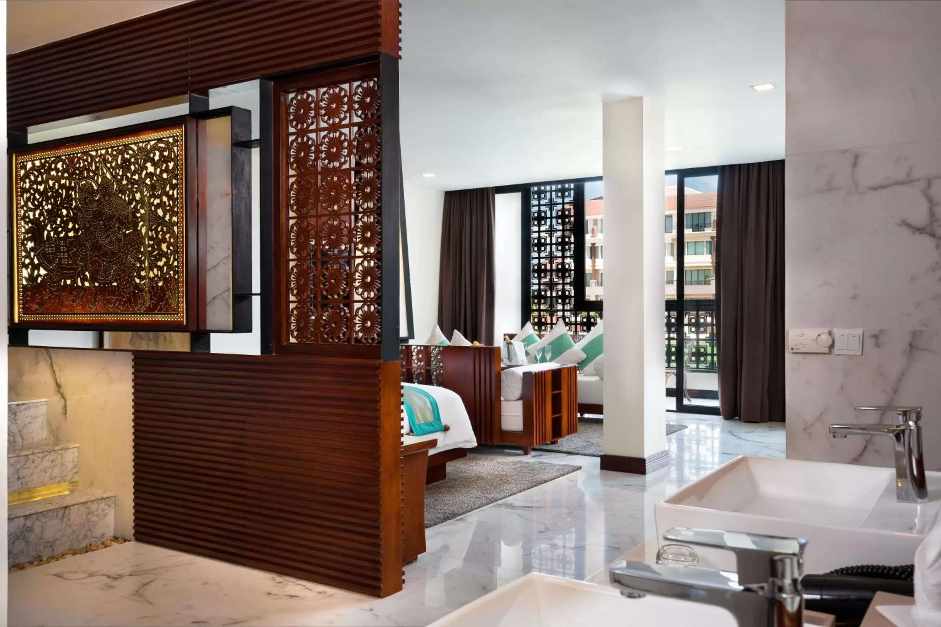 Bedroom in Lotus Blanc Hotel