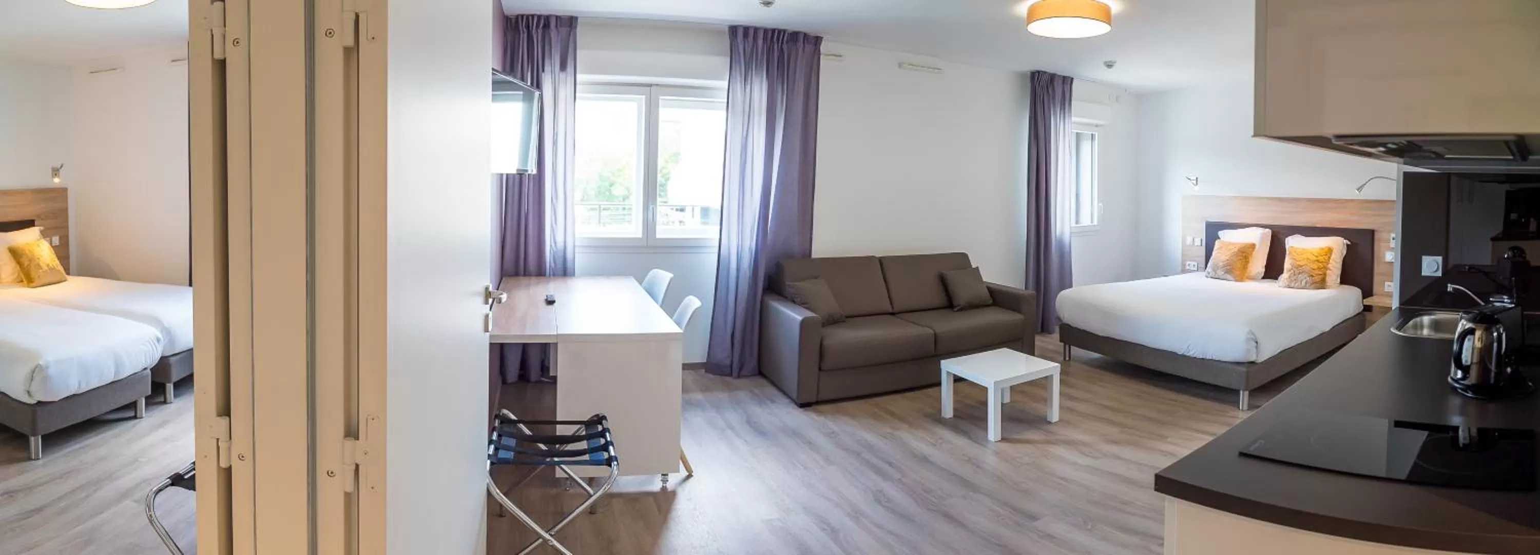 Living room, Bed in All Suites Appart Hôtel - Choisy-le-Roi