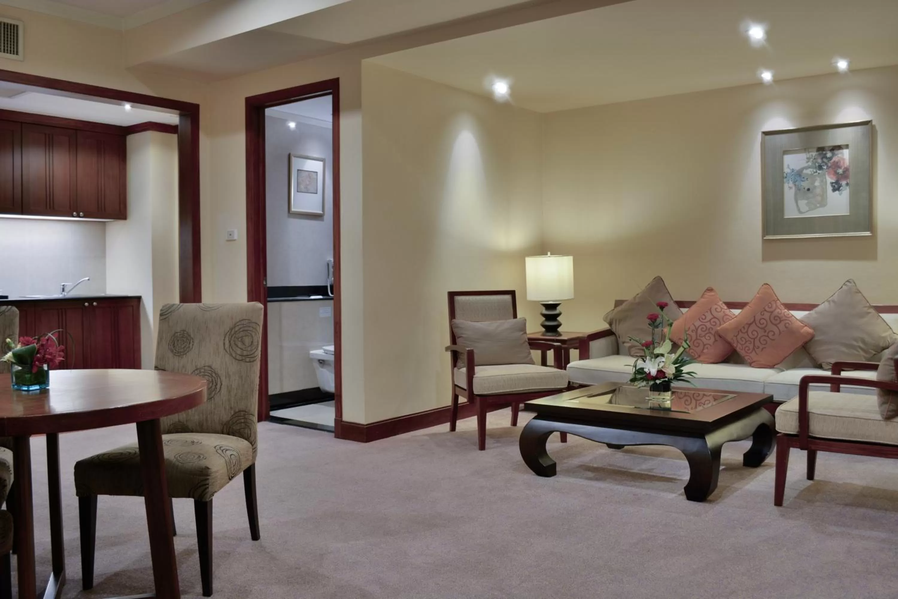 Living room in Rama Gardens Hotel Bangkok