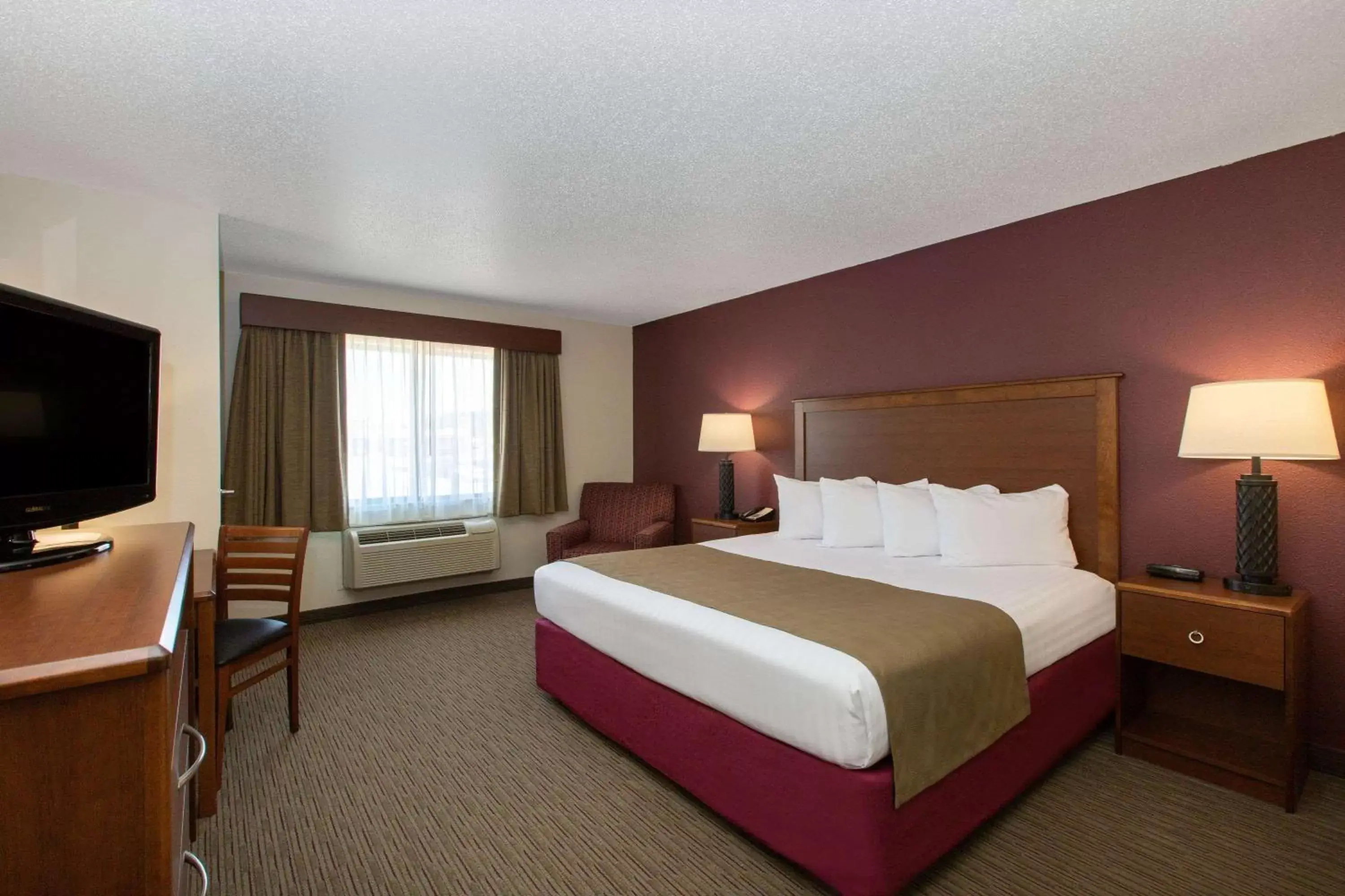 Photo of the whole room, Bed in AmericInn by Wyndham Merrill