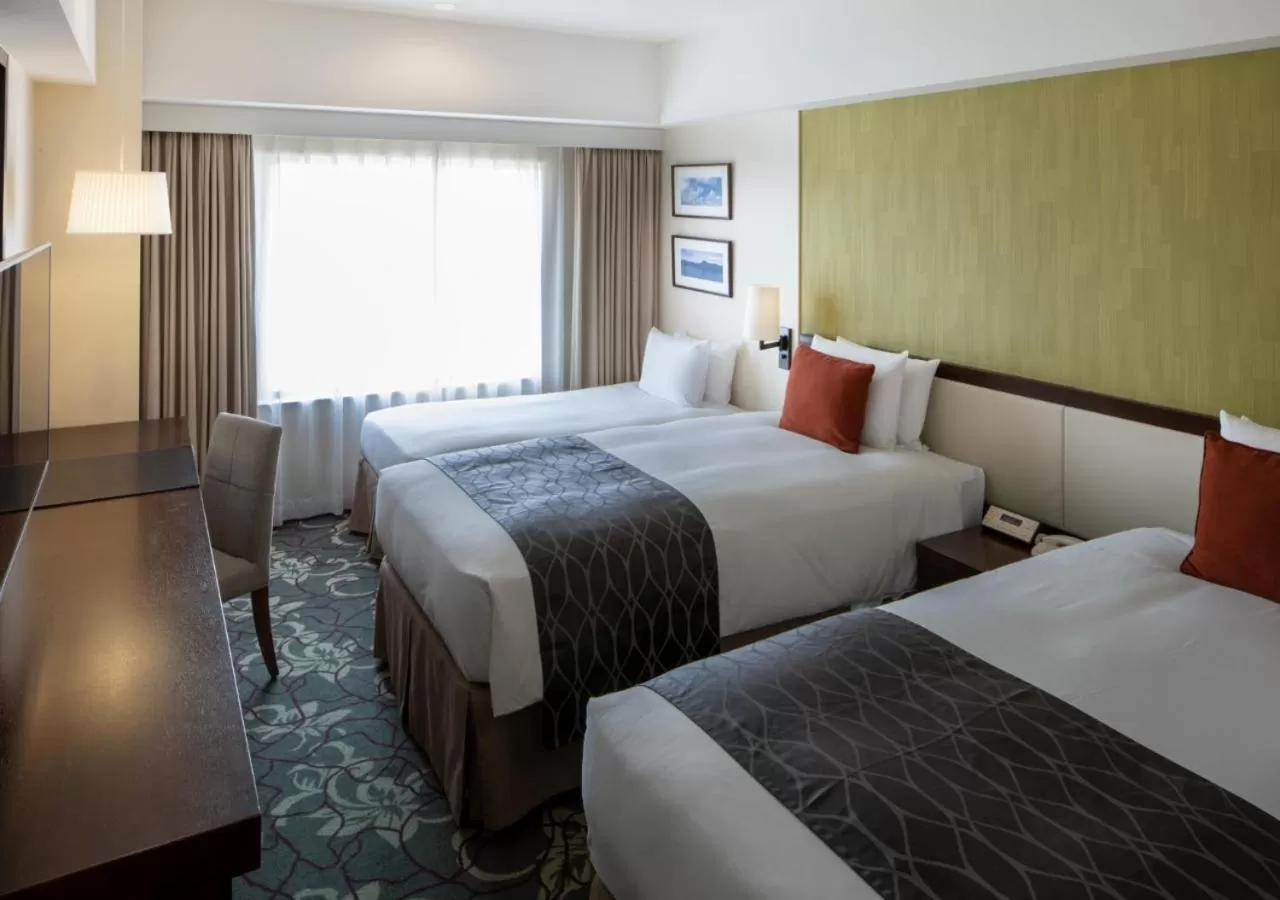 Bed in Hotel Metropolitan Tokyo Ikebukuro