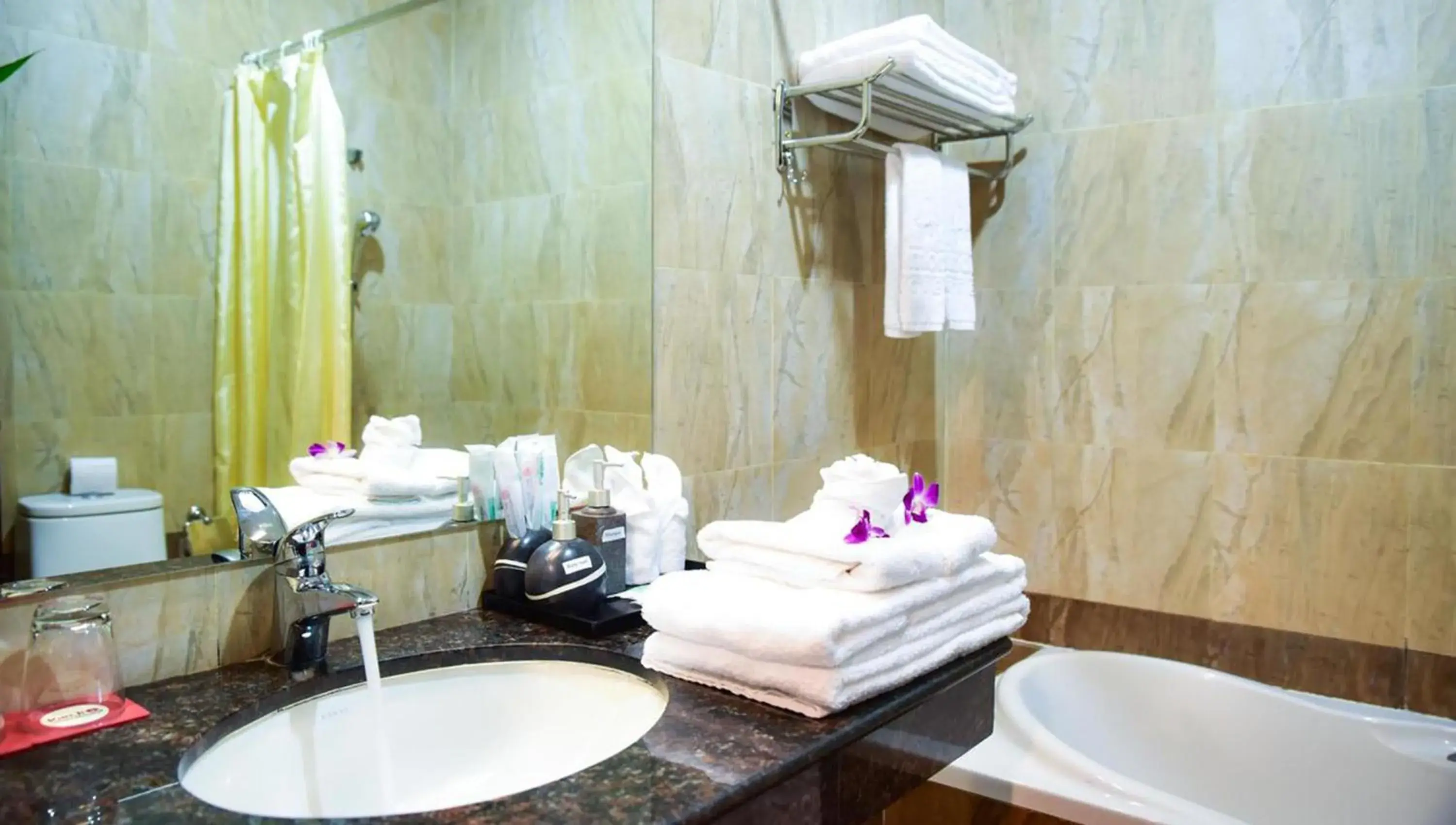 Bathroom in Almond Hotel Sothearos Bathroom in Almond Hotel Sothearos