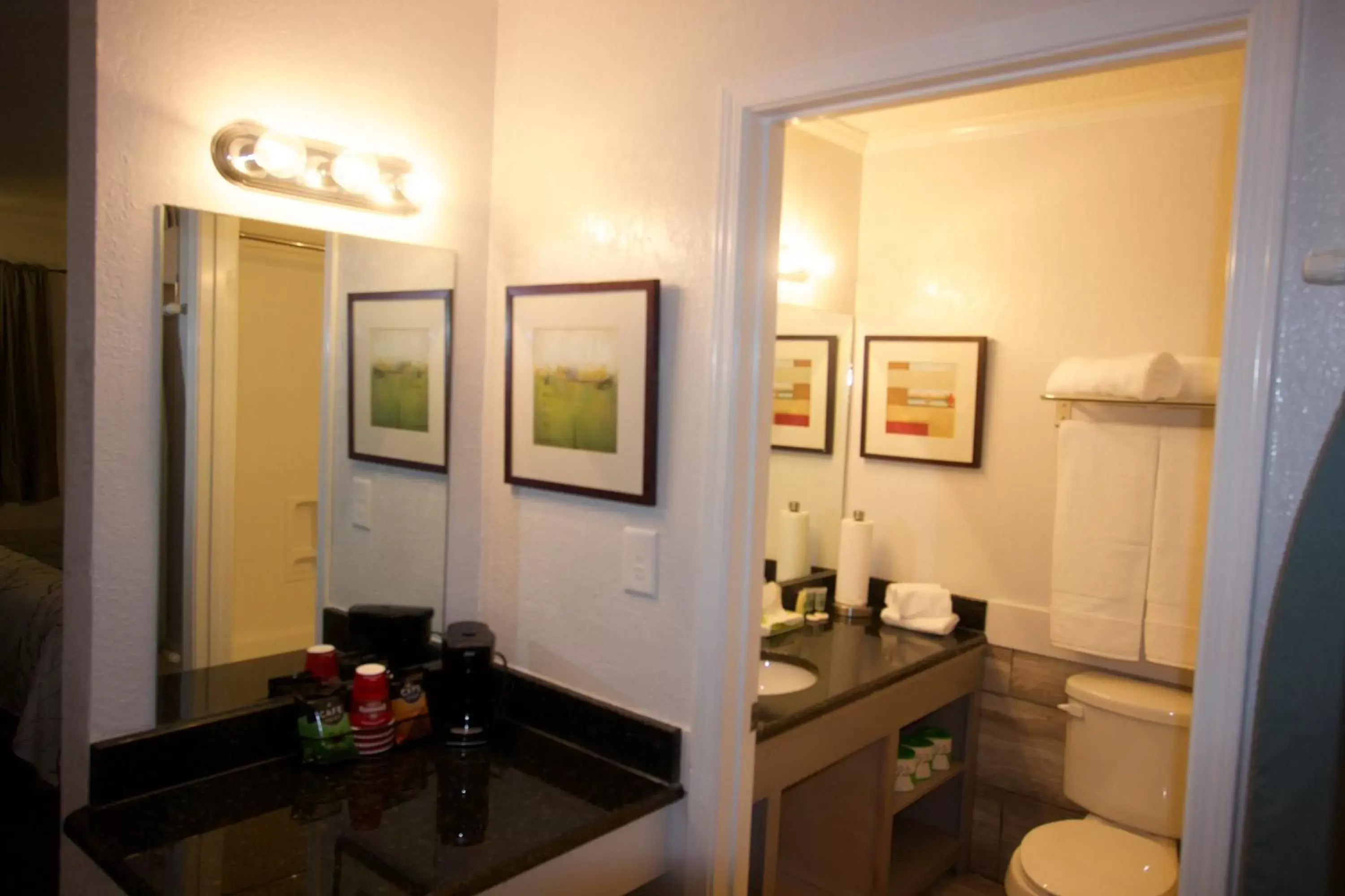 Toilet in At Home Inn & Suites