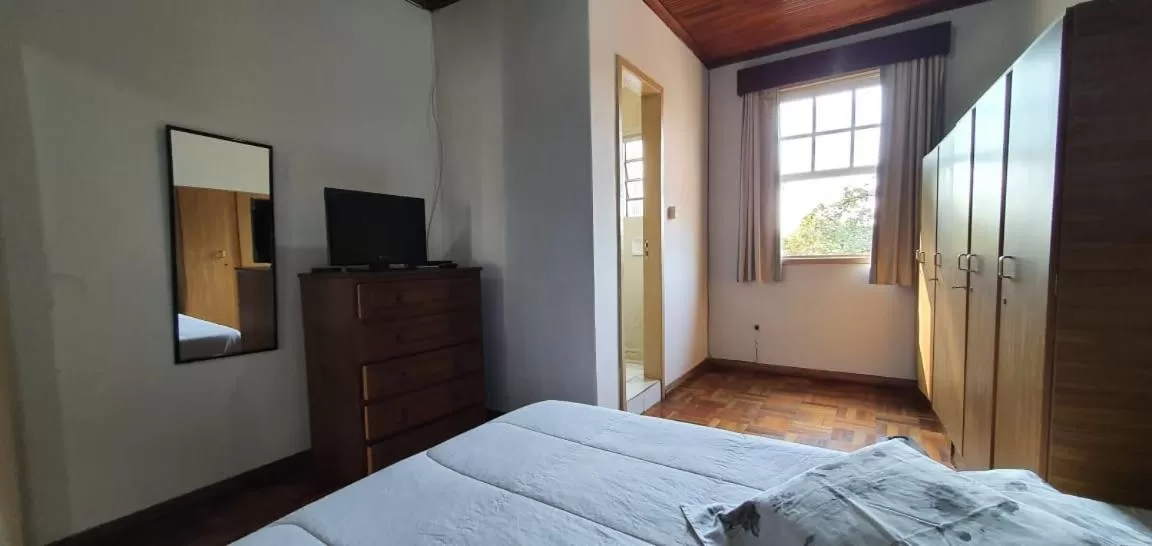 Bed in Apart Hotel Flomon