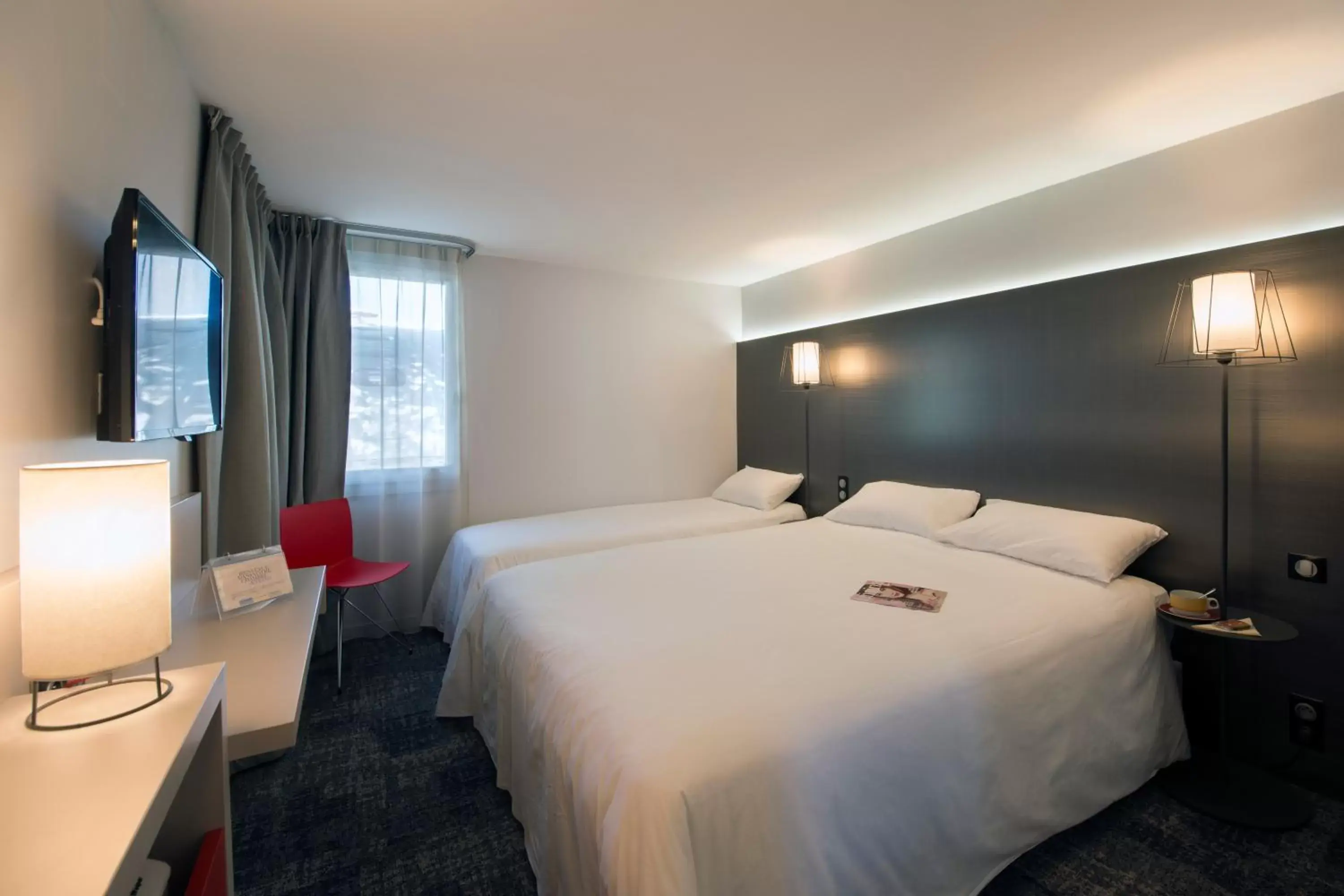 Bed in L'hôtel by JOA de Saint-Paul-Lès-Dax