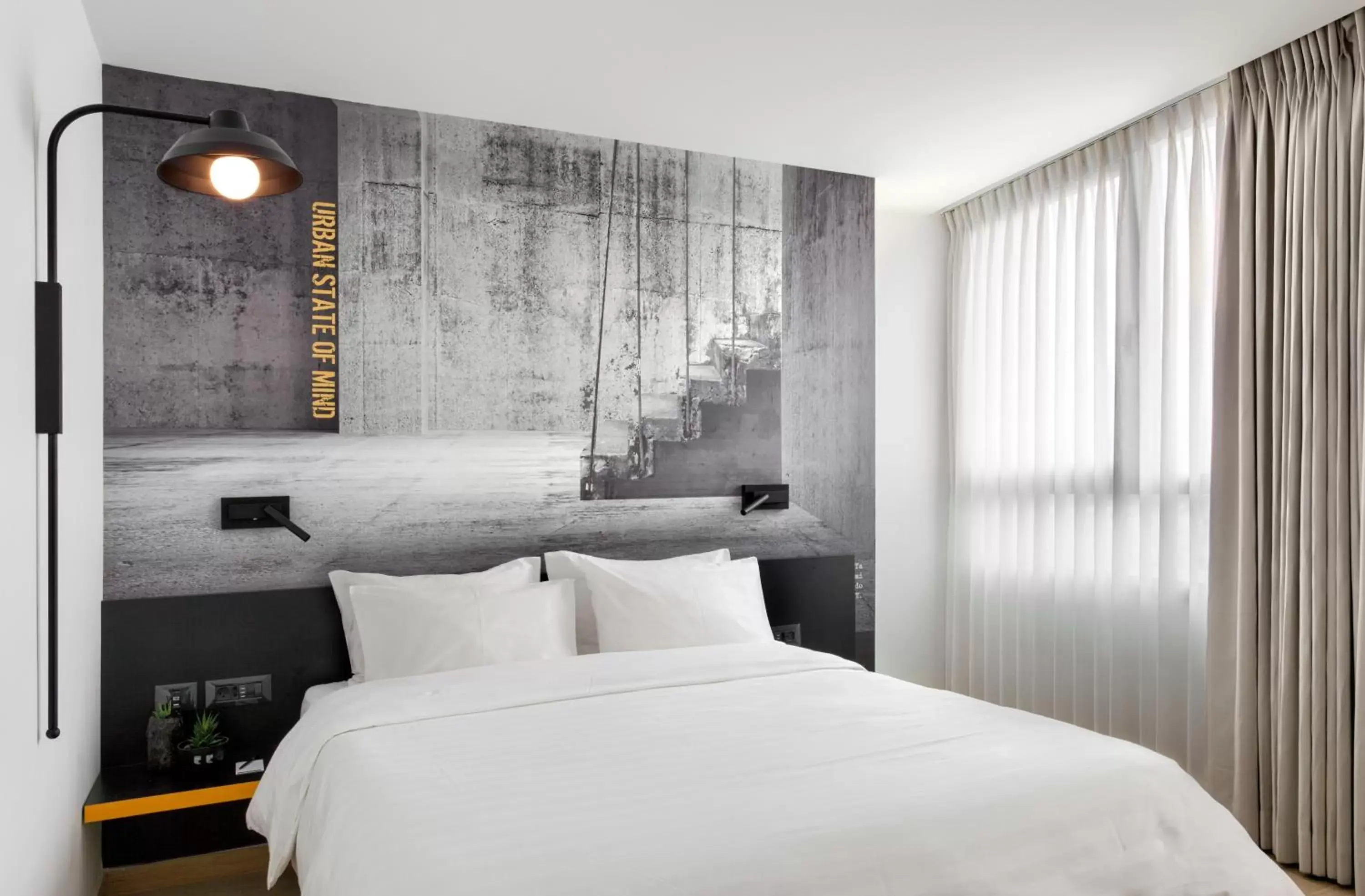 Bed in BY14 TLV Hotel