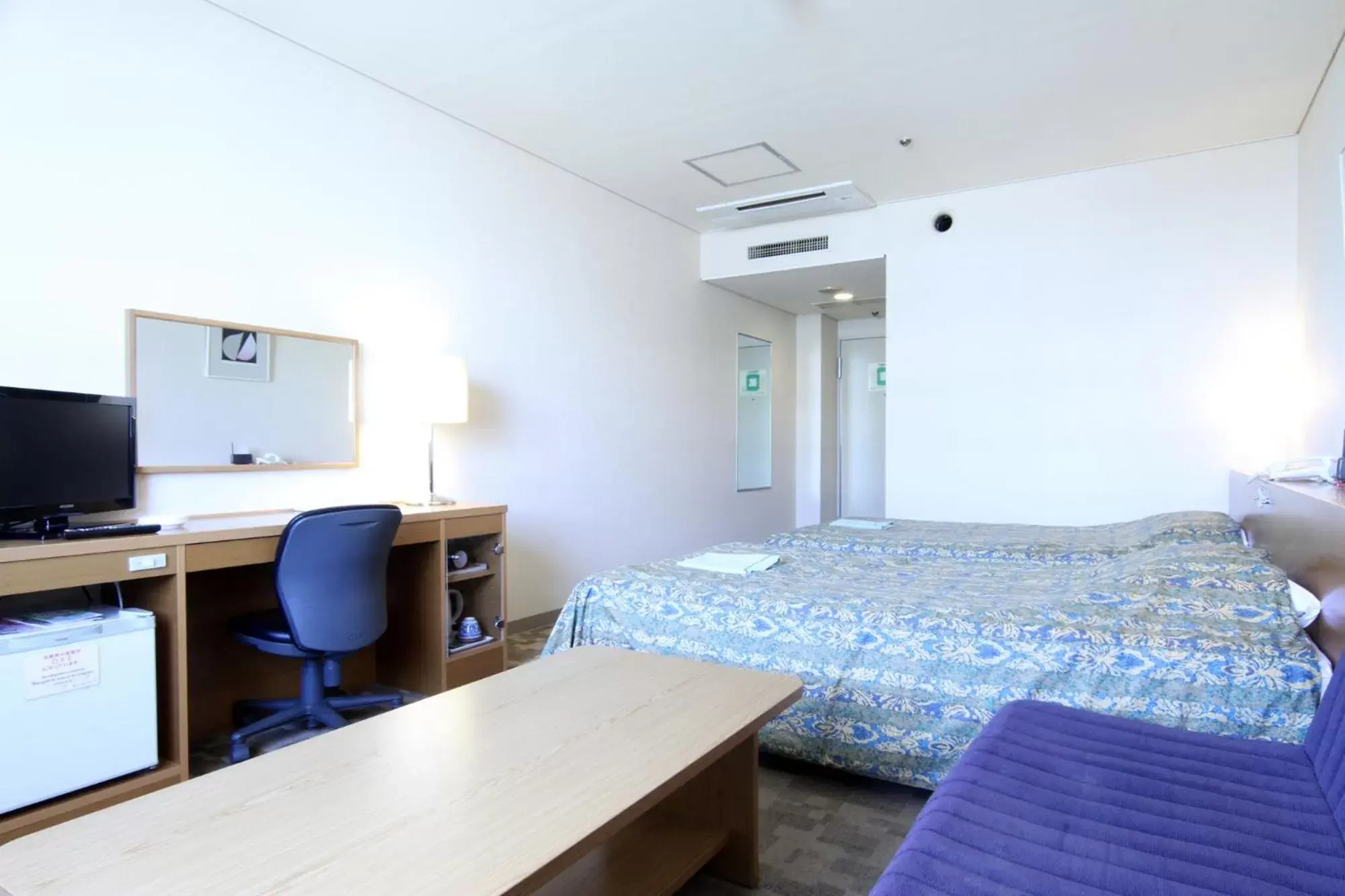 Bed in Hotel Hiroshima Sunplaza