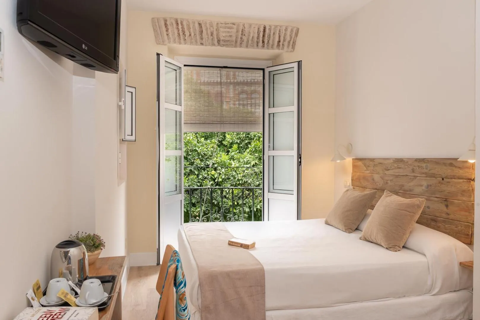 Bed in Hotel Boutique Elvira Plaza