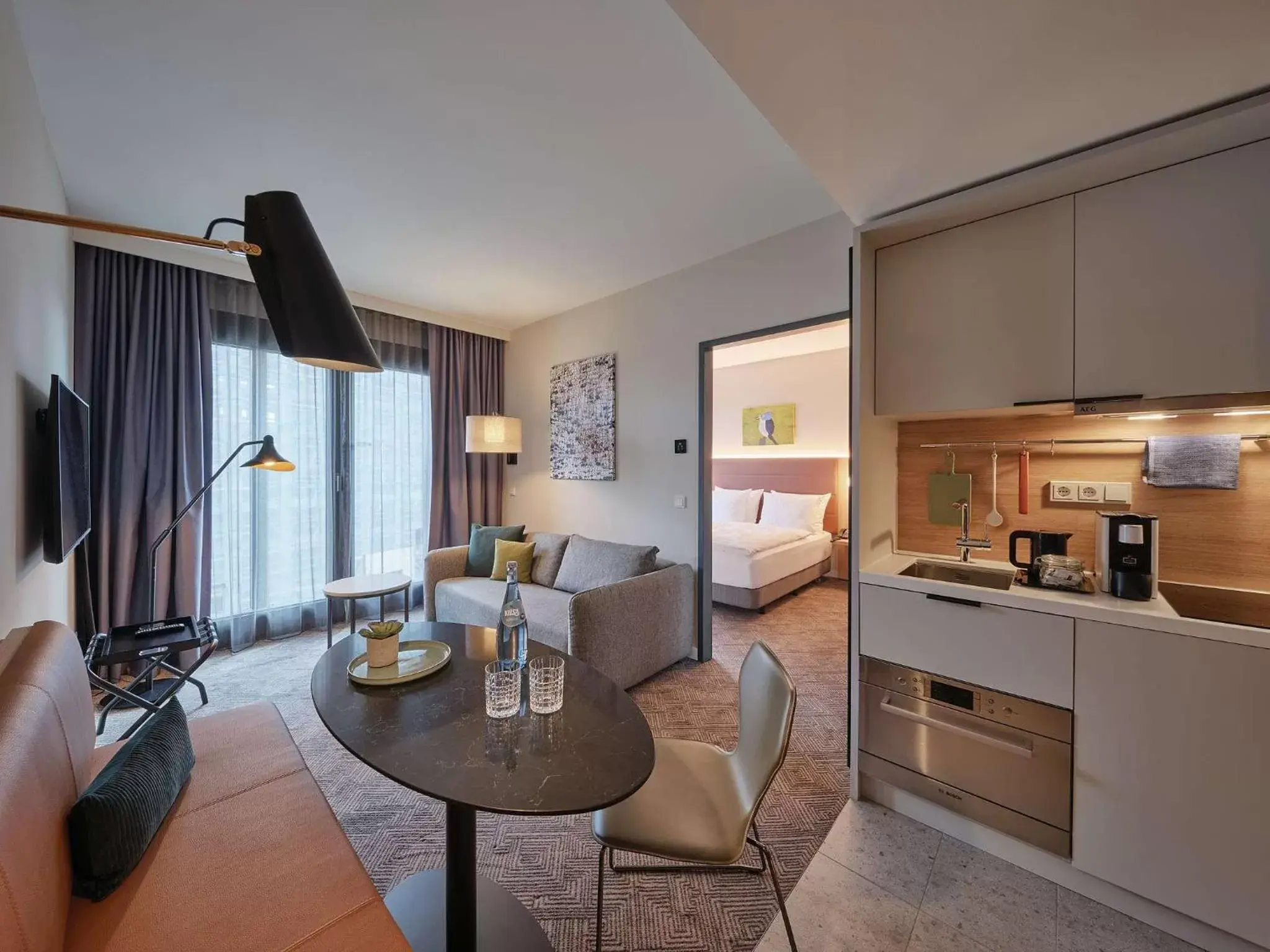Bedroom, Kitchen/Kitchenette in Adina Apartment Hotel Cologne
