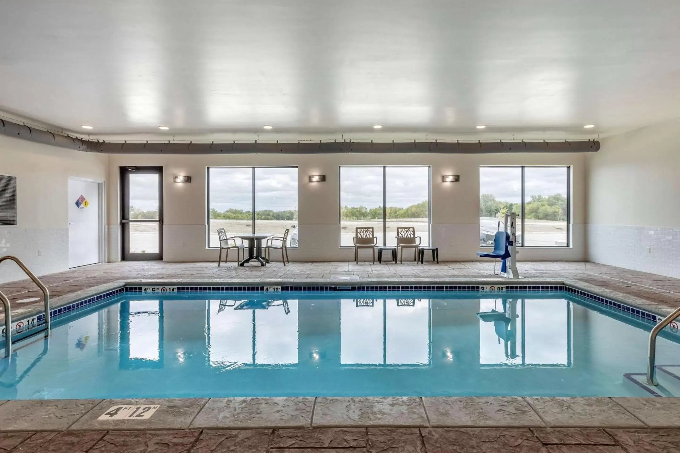 Swimming pool in MainStay Suites Waukee-West Des Moines Swimming pool in MainStay Suites Waukee-West Des Moines